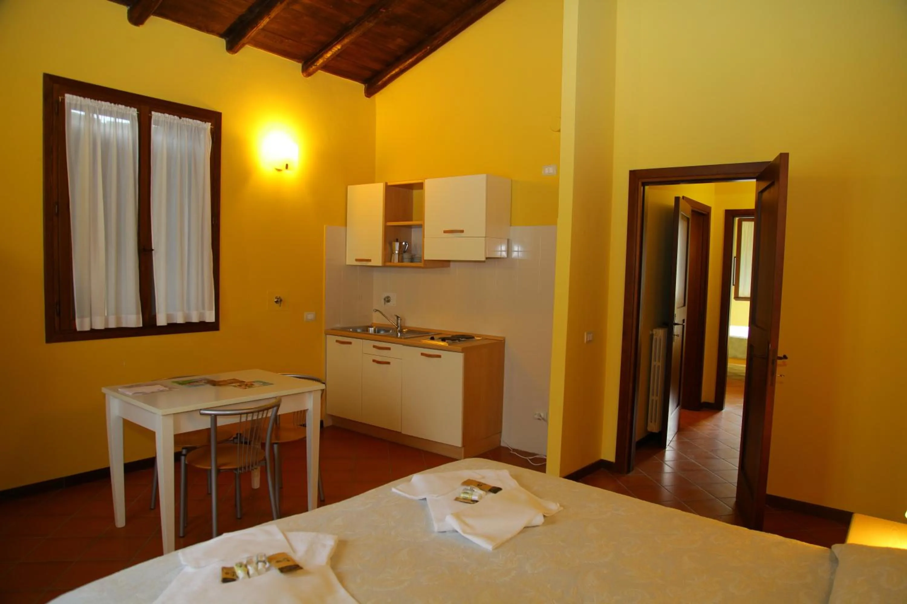 Photo of the whole room, Bed in Villaggio Della Salute Più