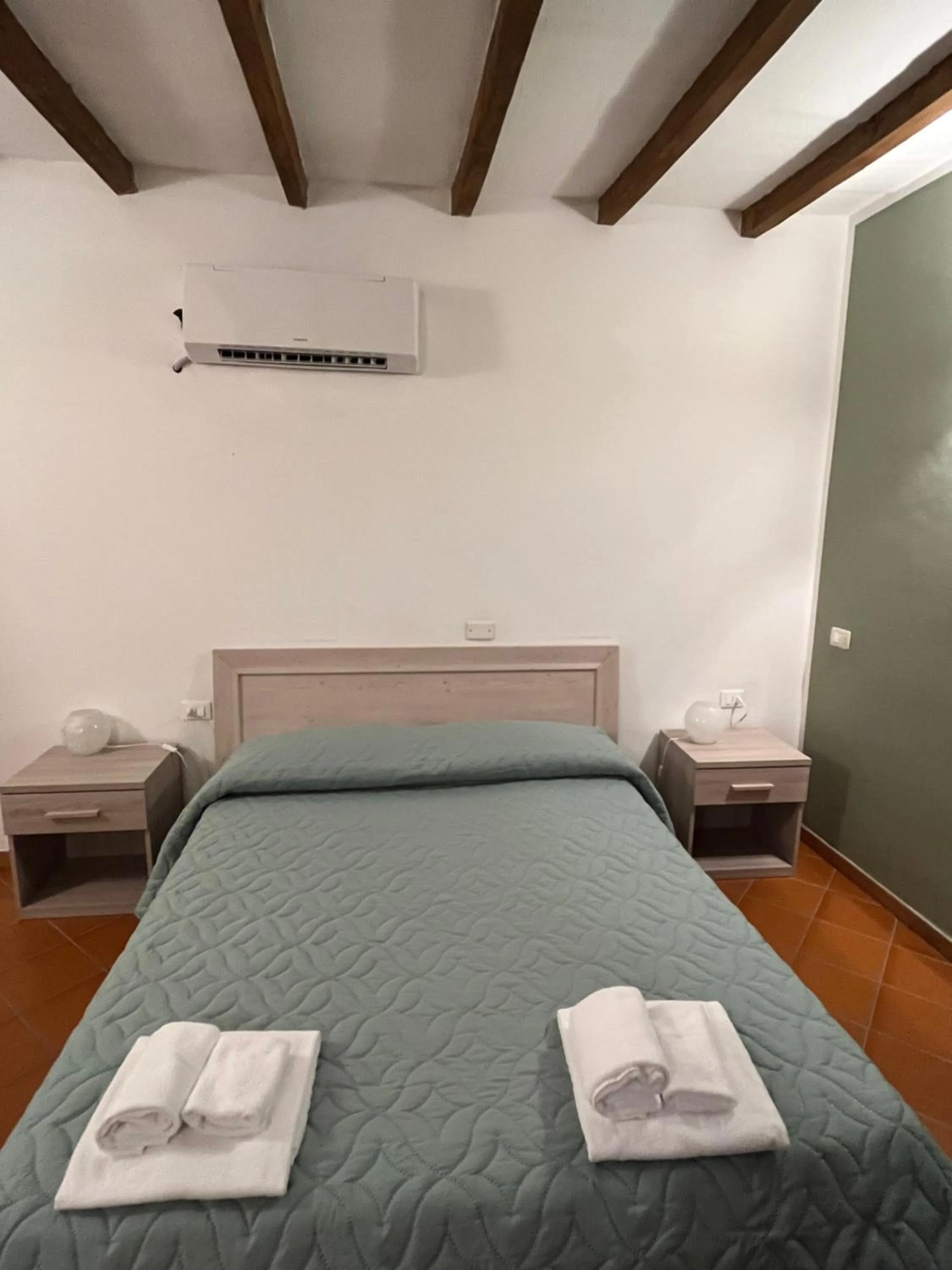 Photo of the whole room, Bed in Villaggio Della Salute Più