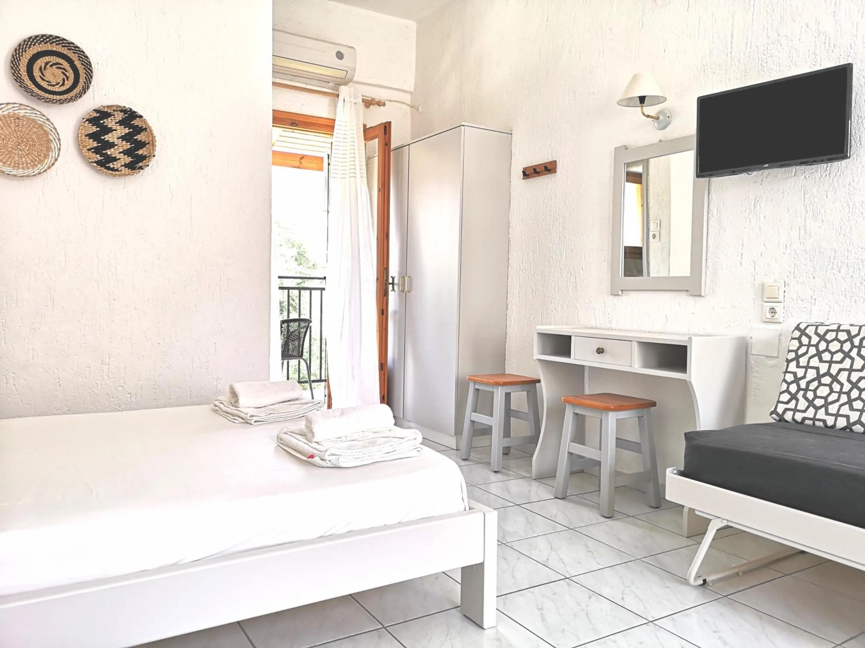 Bedroom, Bed in Emilia Apartments