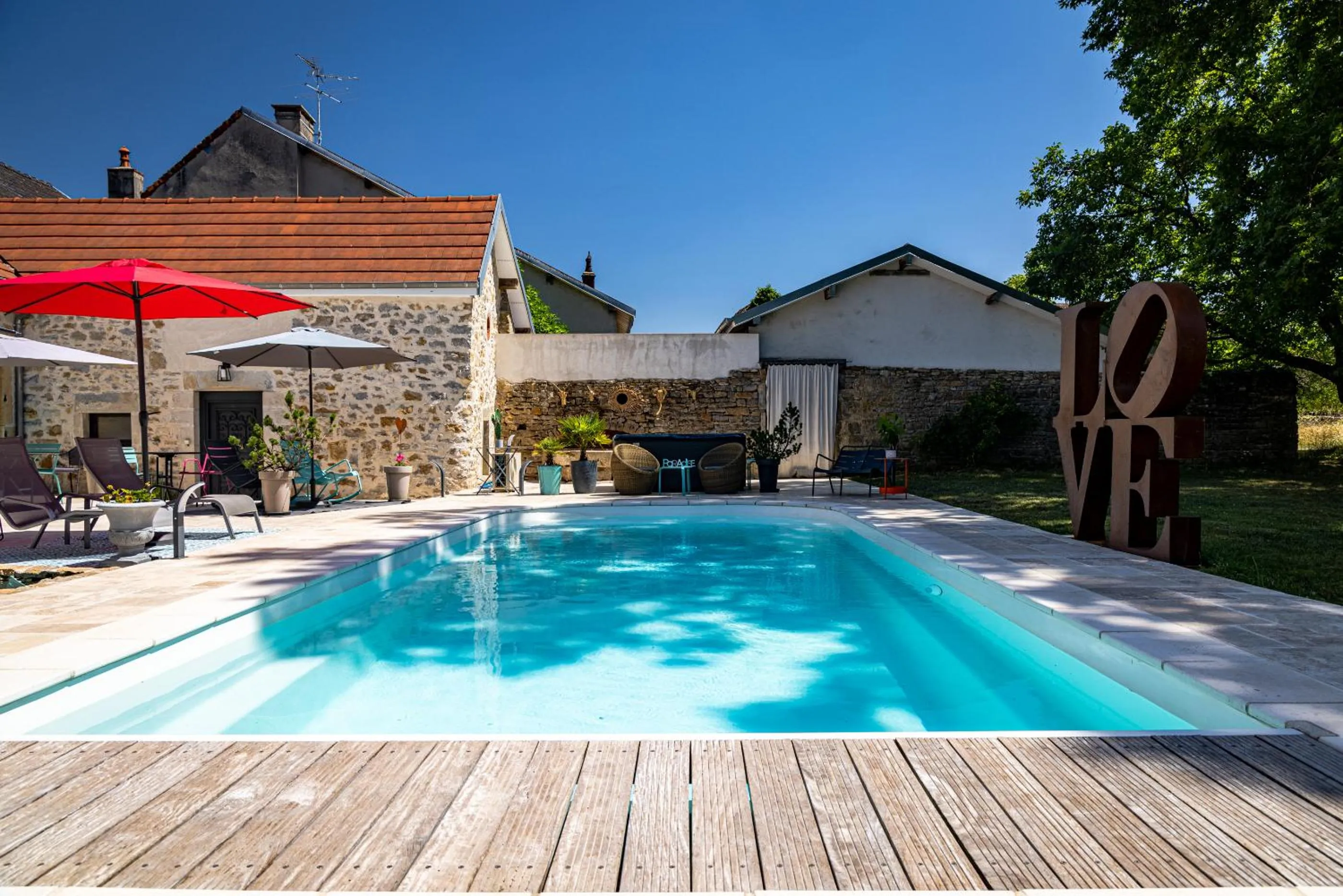 Pool view in Le 49 Côté Parc & SPA