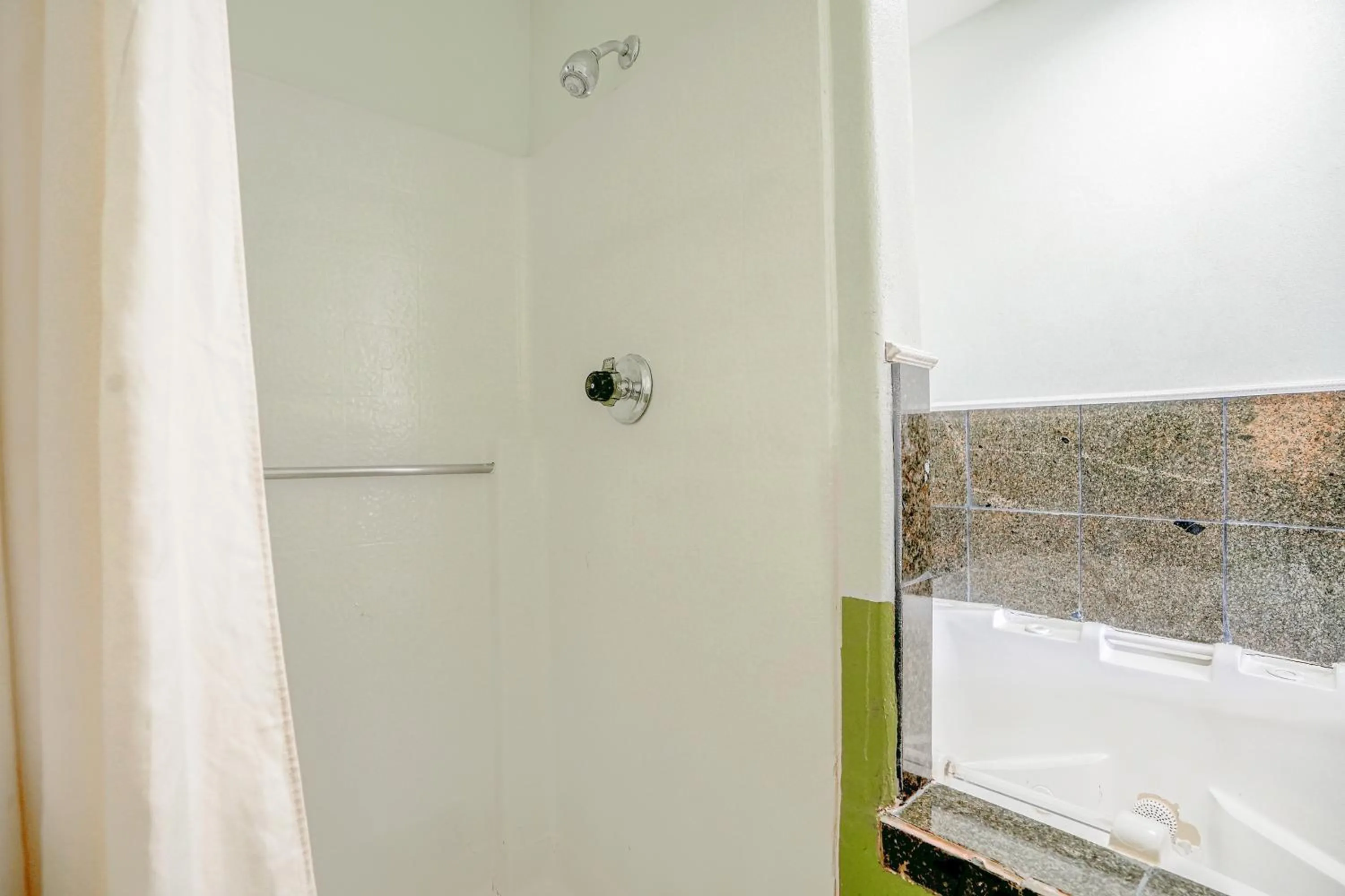 Bathroom in Day & Night Inn