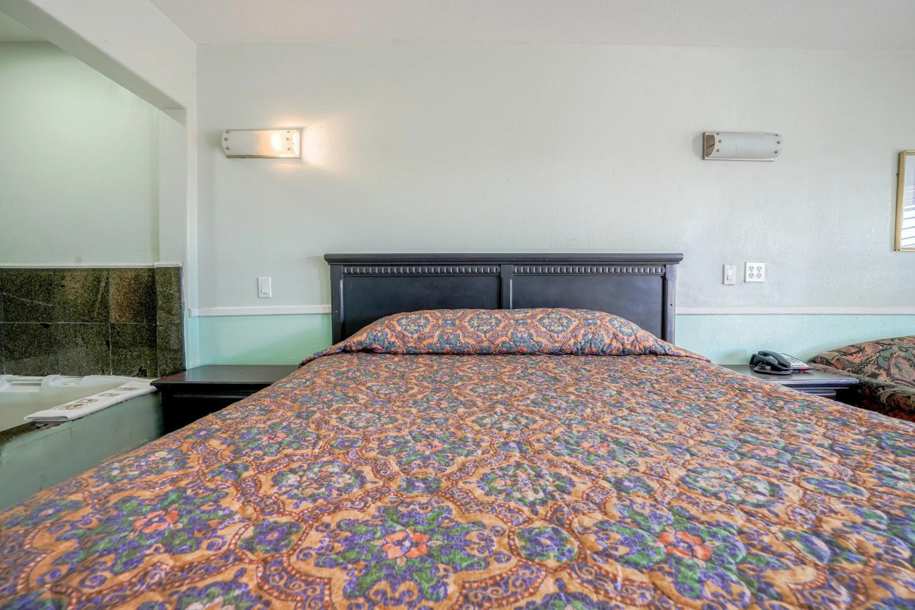 Bedroom, Bed in Day & Night Inn