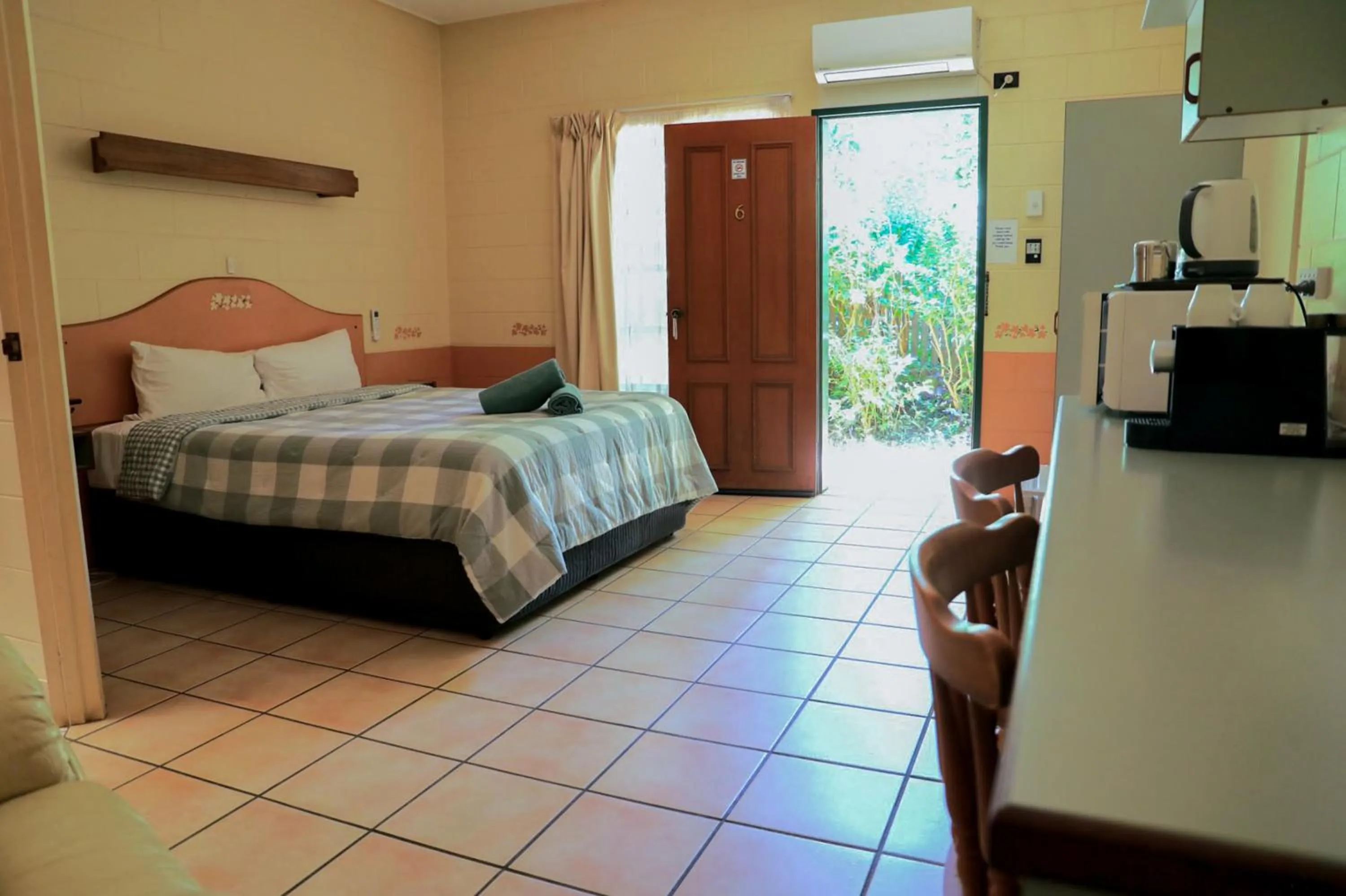 Bed in Curtain Fig Motel