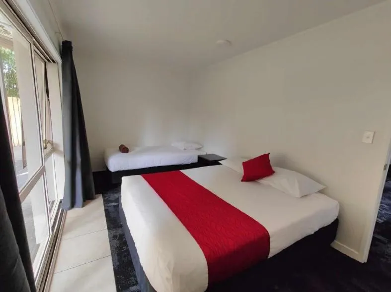 Bed in Hygate Motor Lodge