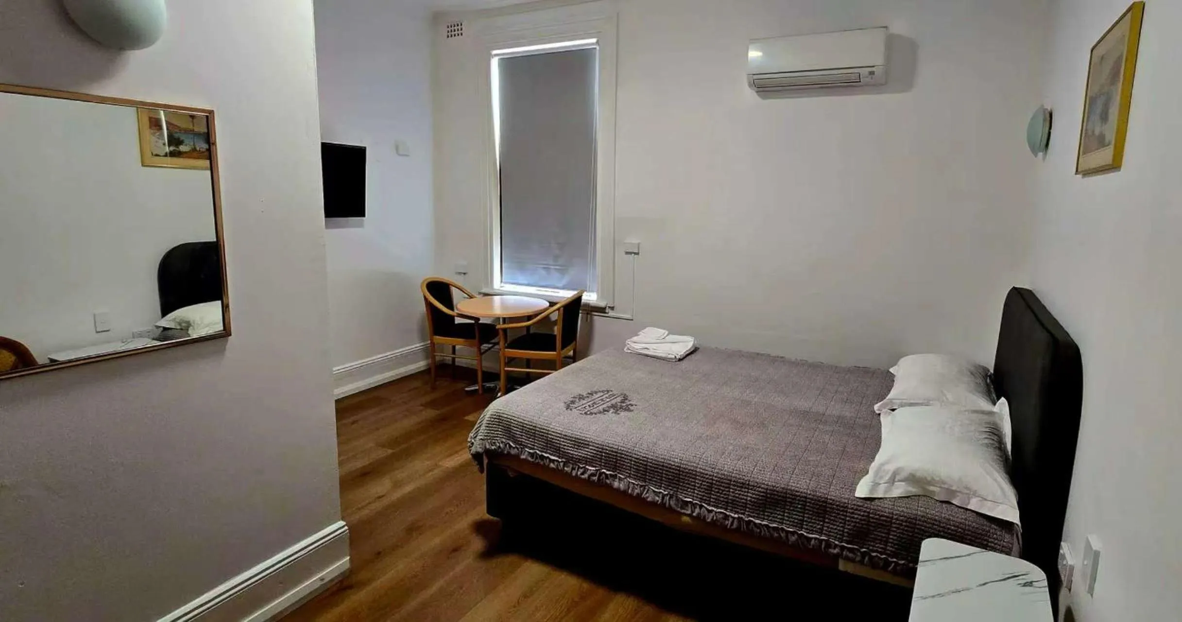 Bed in Alpine Heritage Motel