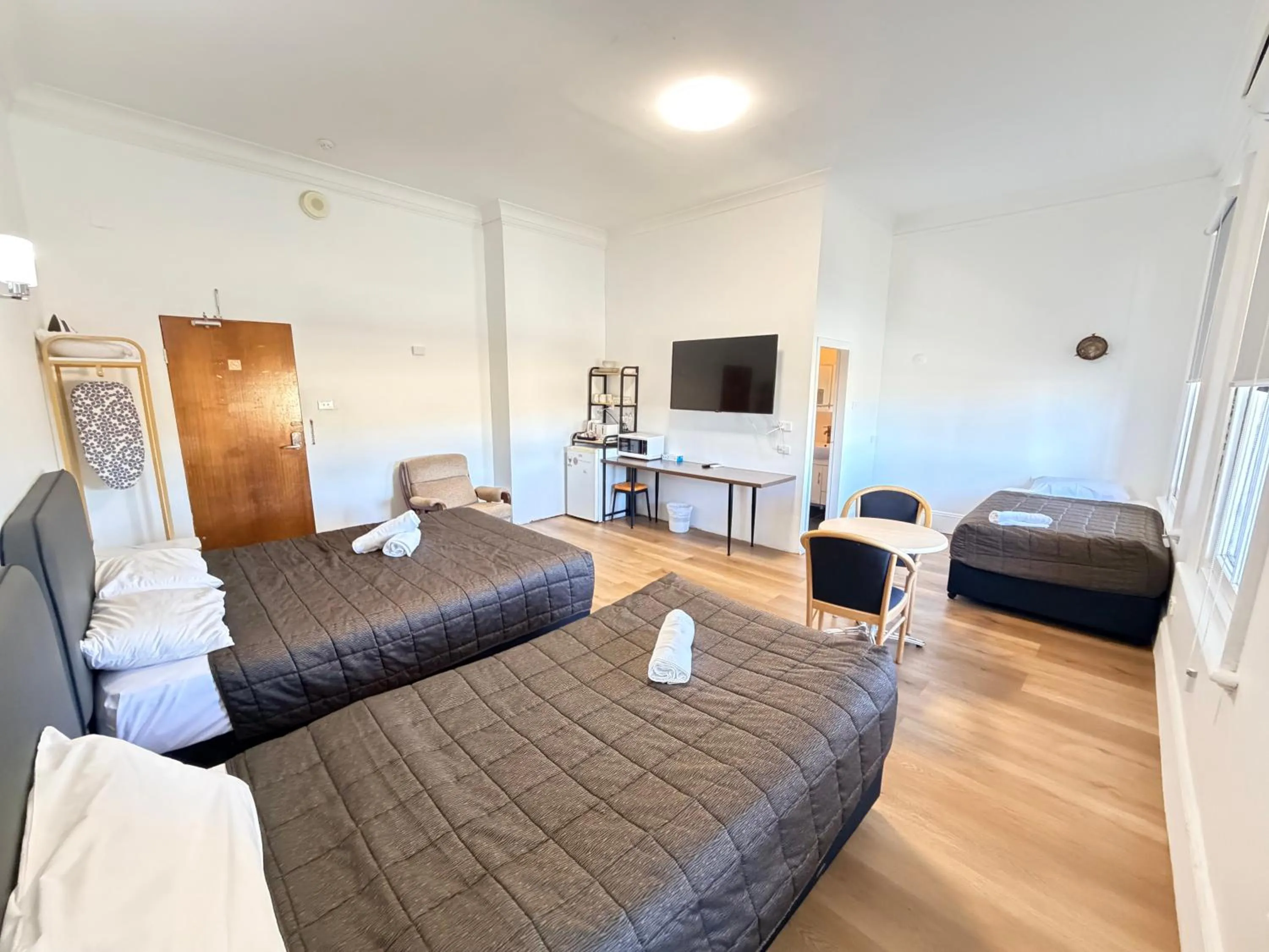 Bed in Alpine Heritage Motel