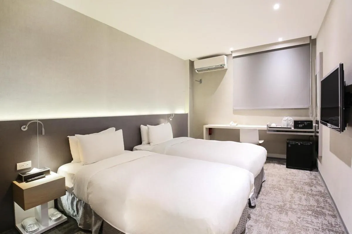 Bed in Cityinn Hotel Taipei Station Branch I
