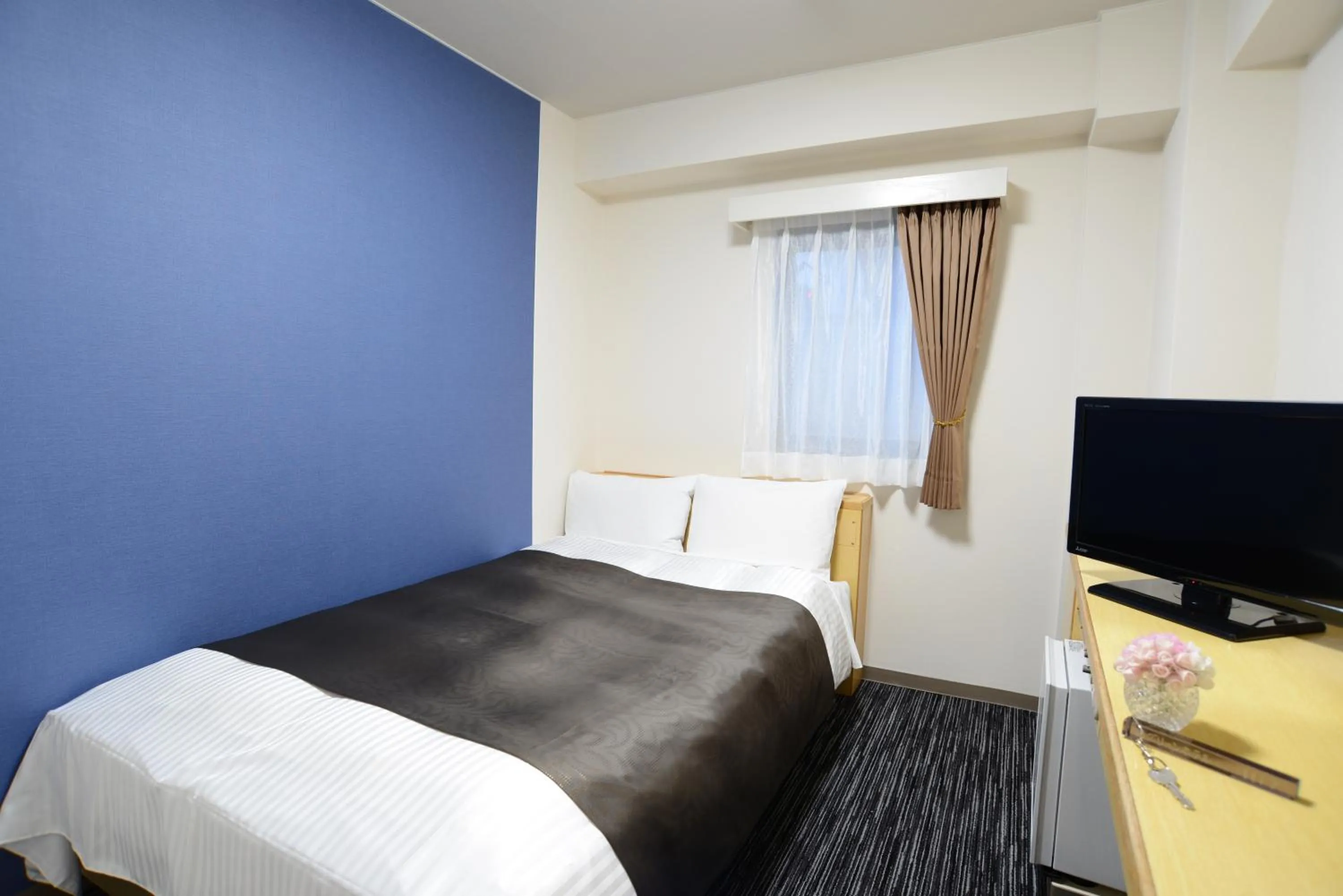 Bed in Nagoya Sakae Green Hotel