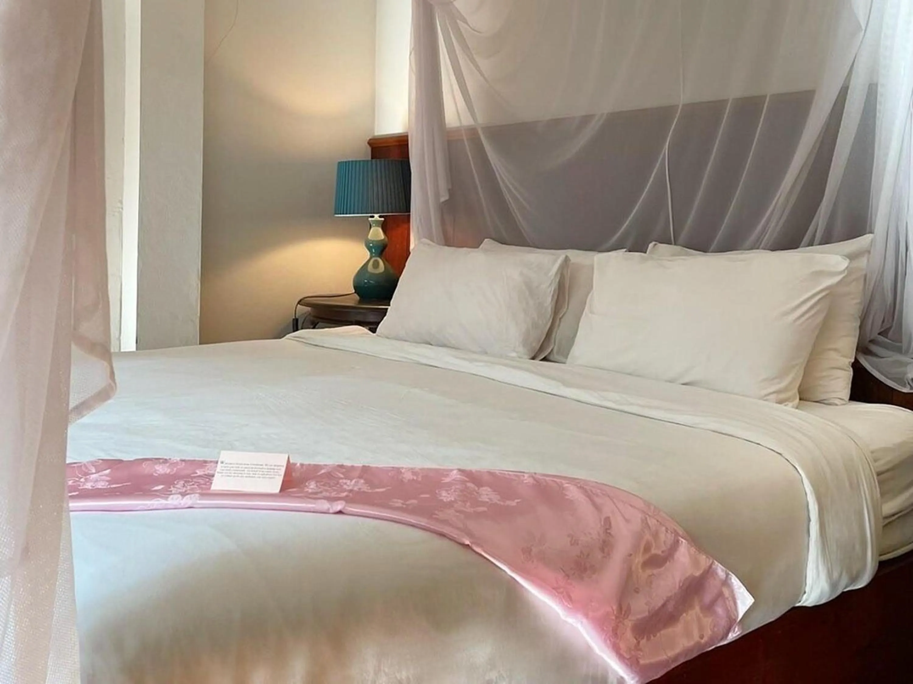 Bed in Seven Senses Guesthouse