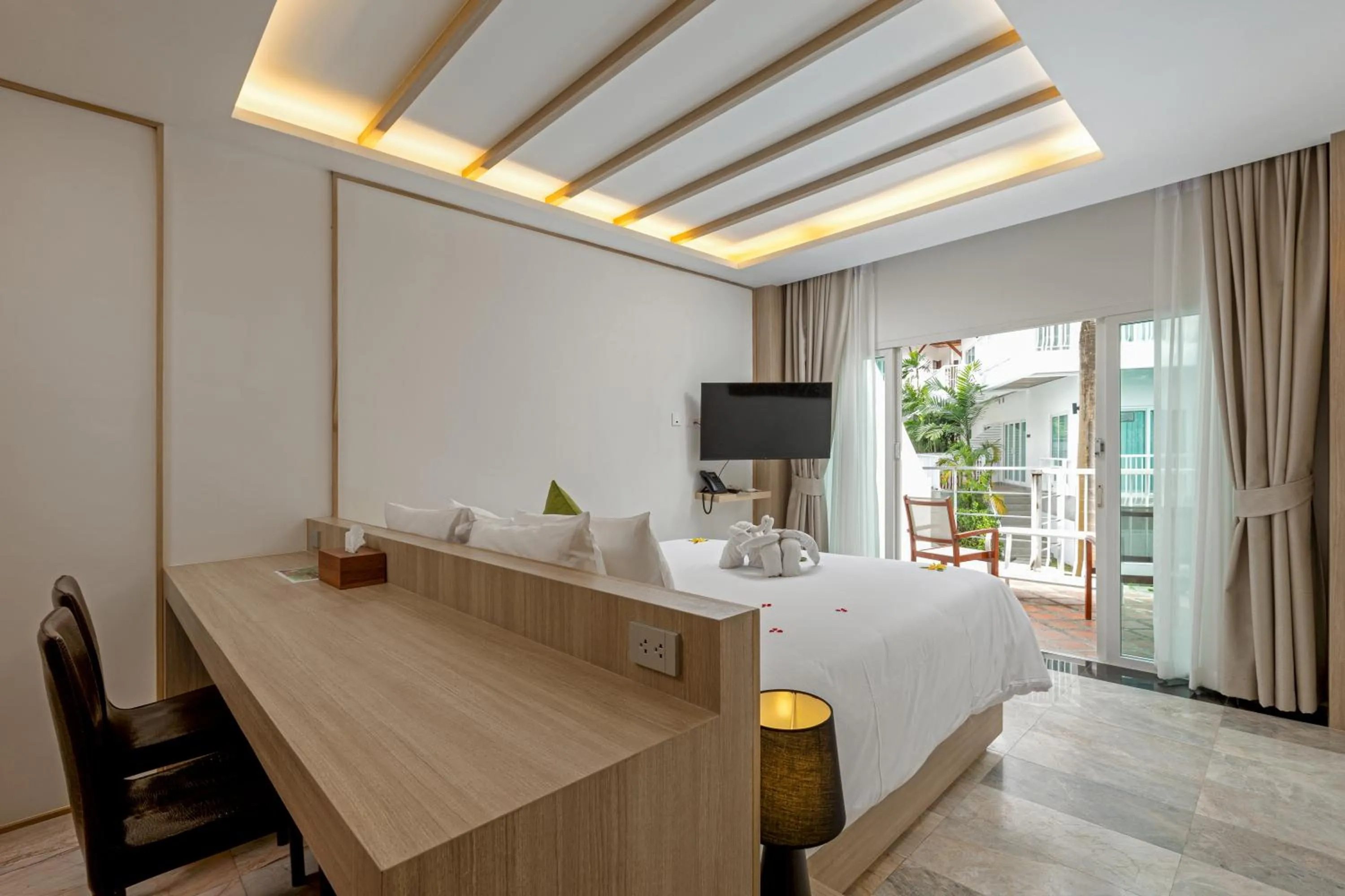 Bedroom in Phunawa Resort Phuket Karon Beach - SHA Plus