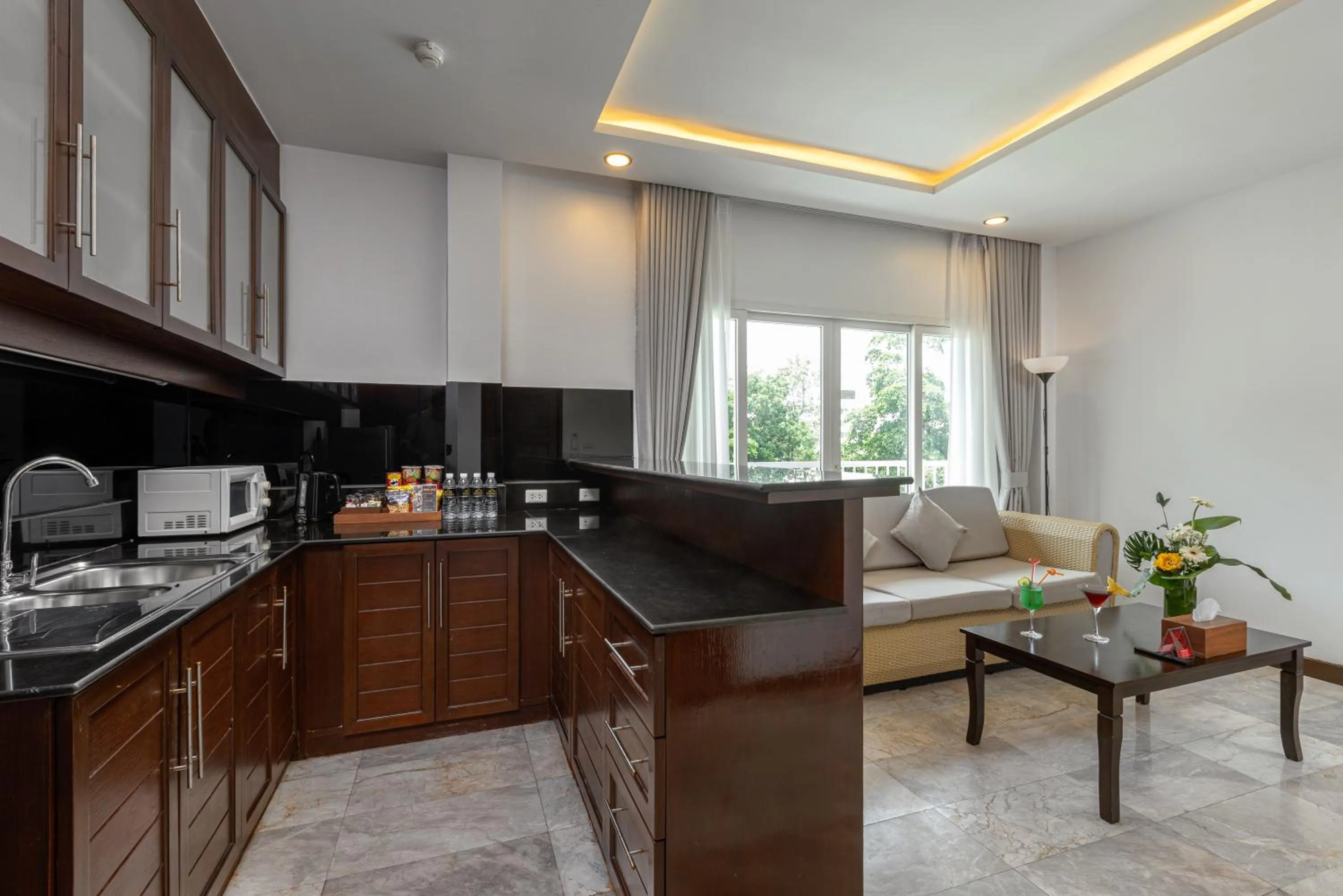 Living room in Phunawa Resort Phuket Karon Beach - SHA Plus