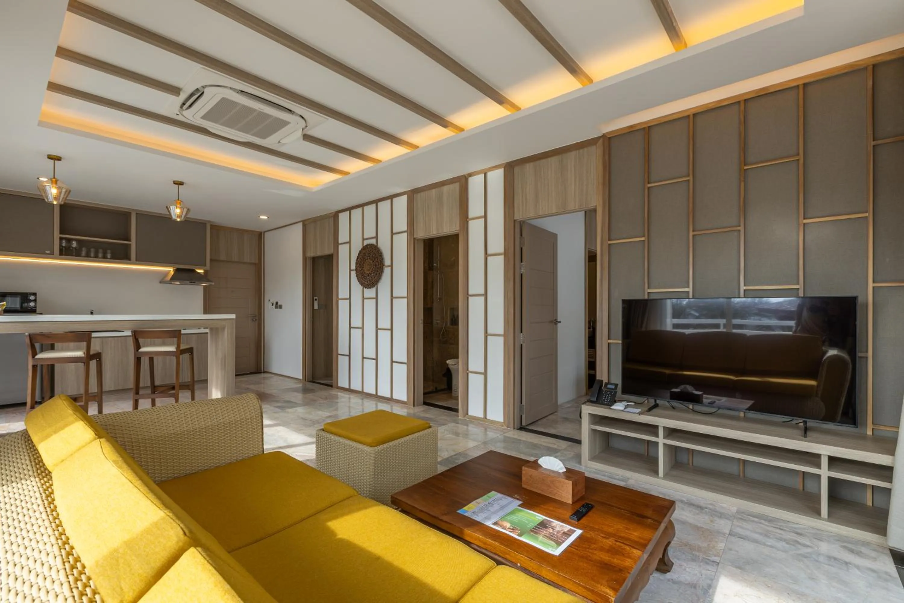 Living room in Phunawa Resort Phuket Karon Beach - SHA Plus