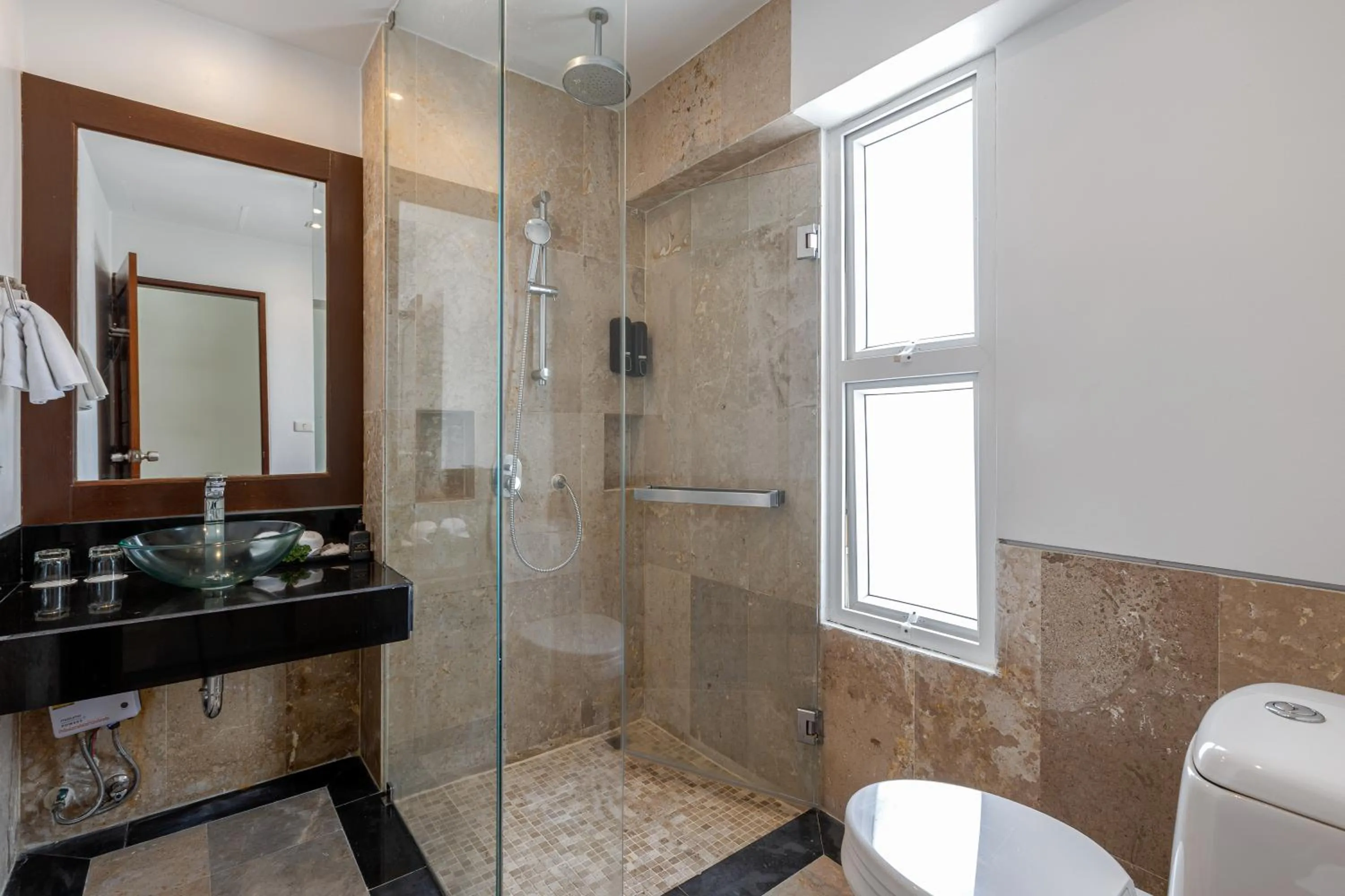 Bathroom in Phunawa Resort Phuket Karon Beach - SHA Plus