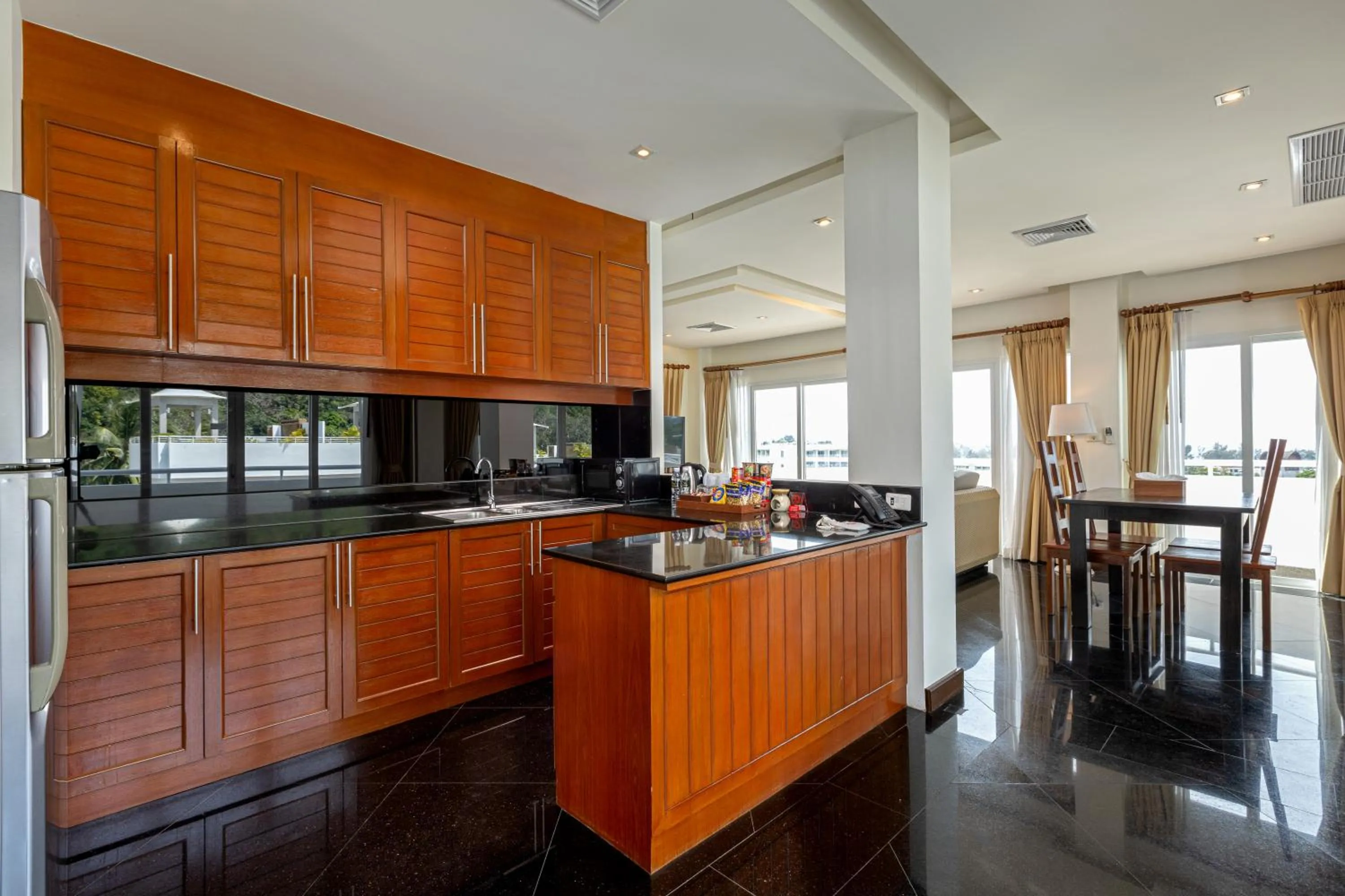 Dining area in Phunawa Resort Phuket Karon Beach - SHA Plus