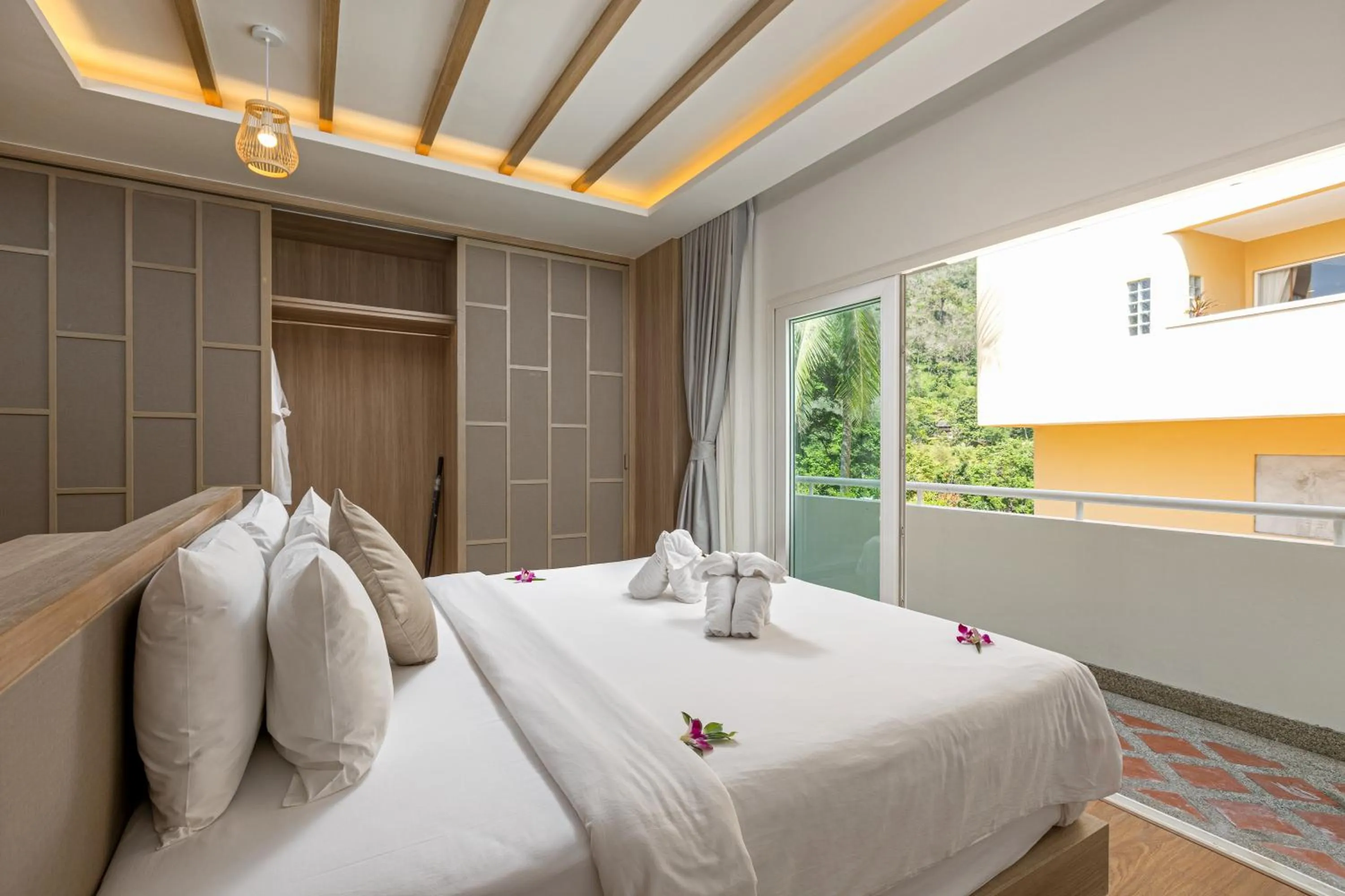Bedroom, Bed in Phunawa Resort Phuket Karon Beach - SHA Plus