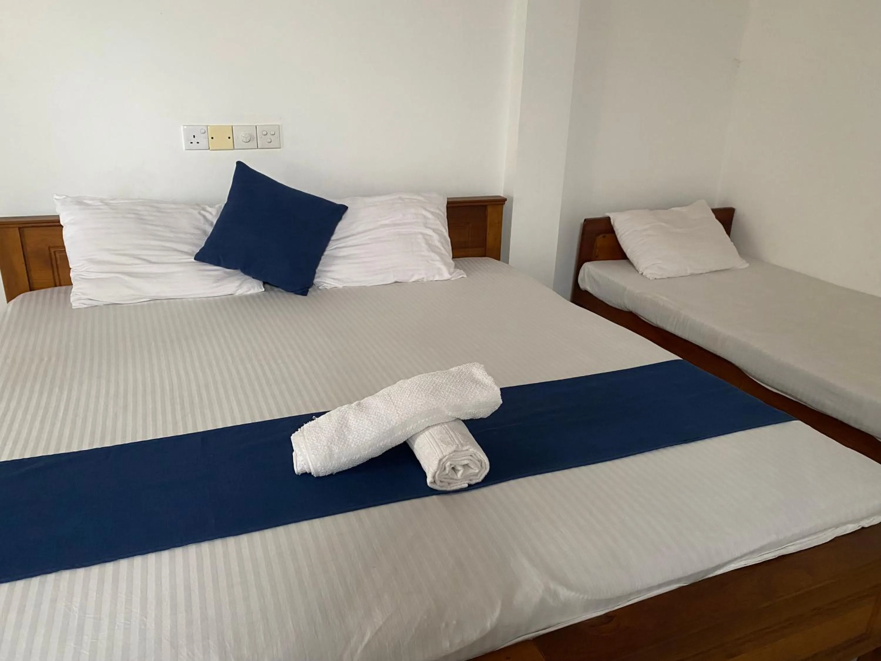 Bed in Himawari Beach Villa