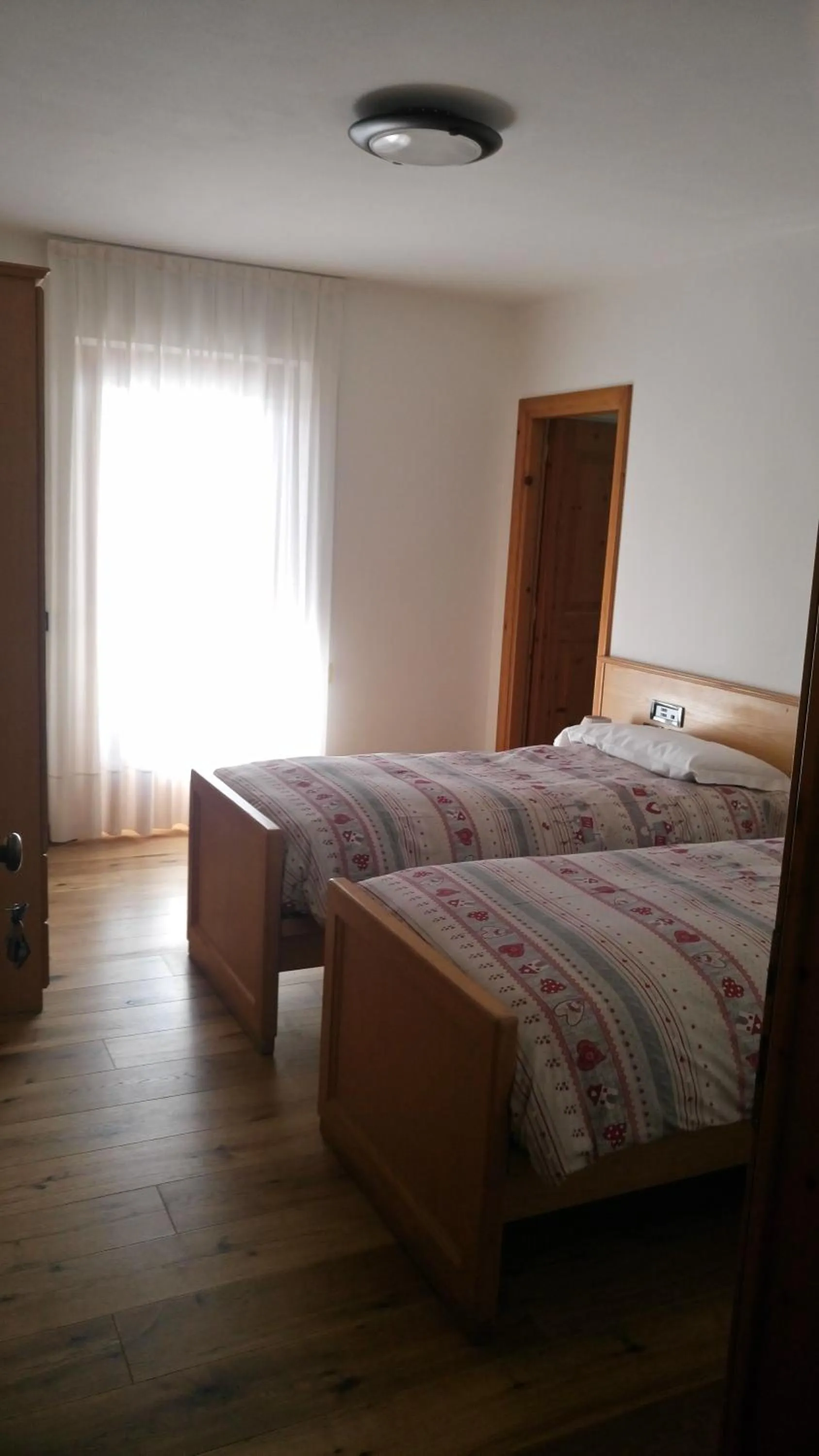 Bed in Meublè Rosalpina