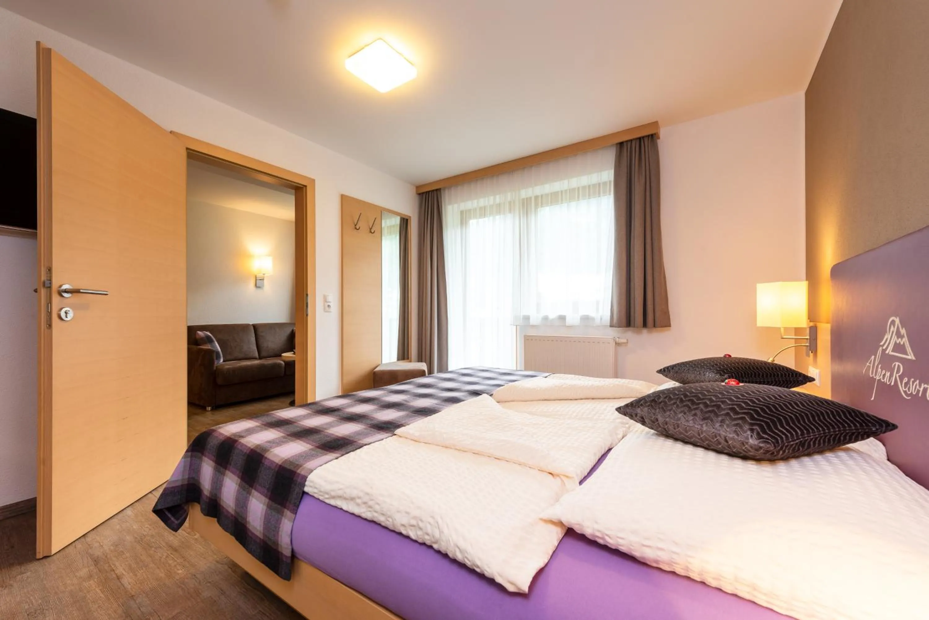 Photo of the whole room, Bed in Alpenresort Thanner