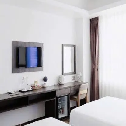 Bed in La Casa Hotel Nha Trang