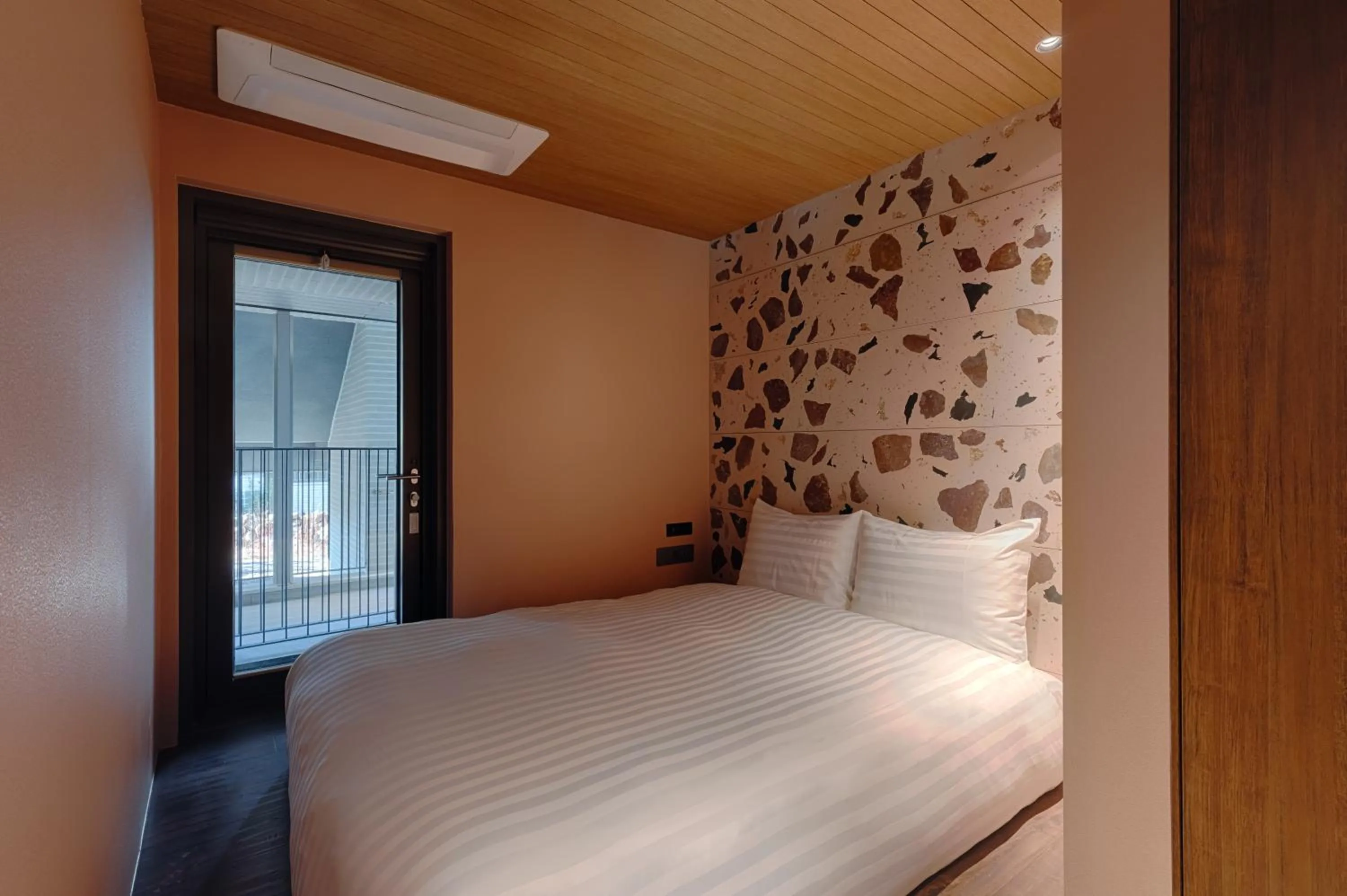 Bed in Sono Calm Jeju