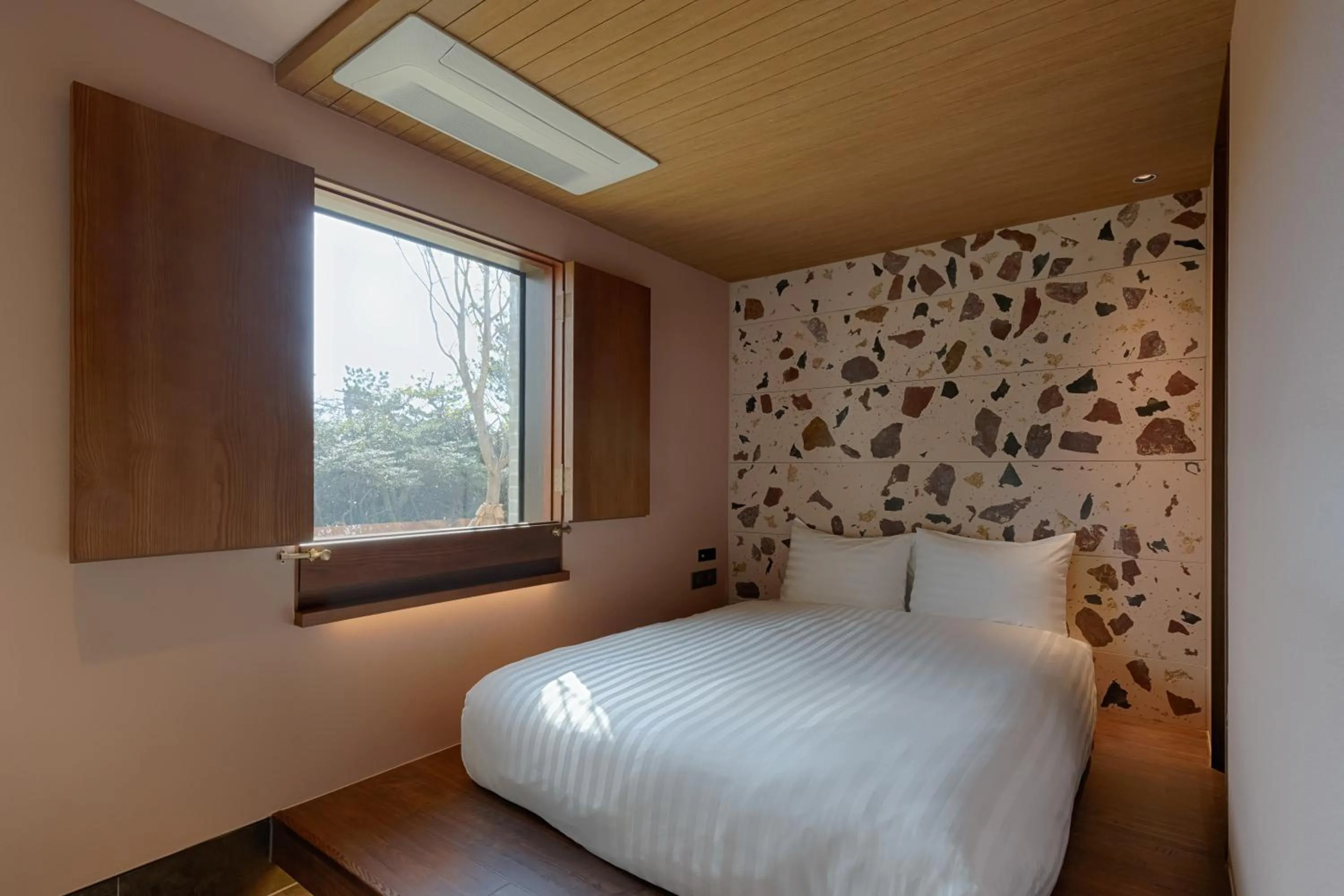 Bed in Sono Calm Jeju