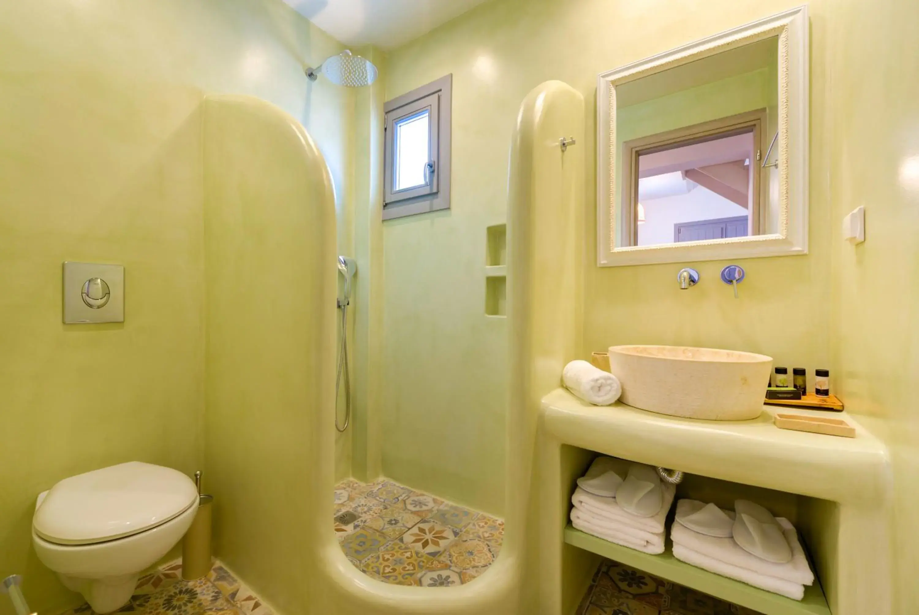 Bathroom in White Harmony Suites Bathroom in White Harmony Suites