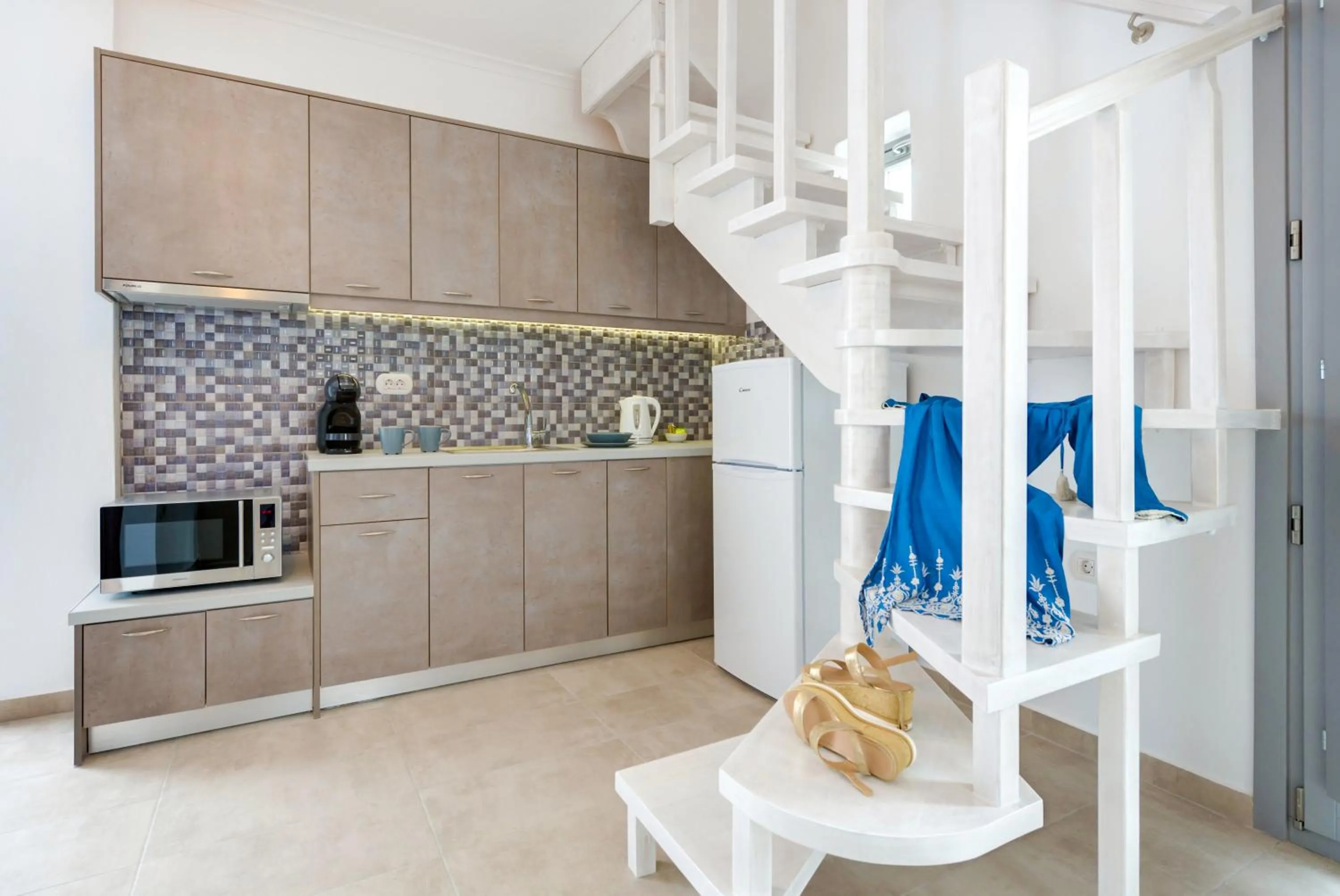 Kitchen or kitchenette in White Harmony Suites