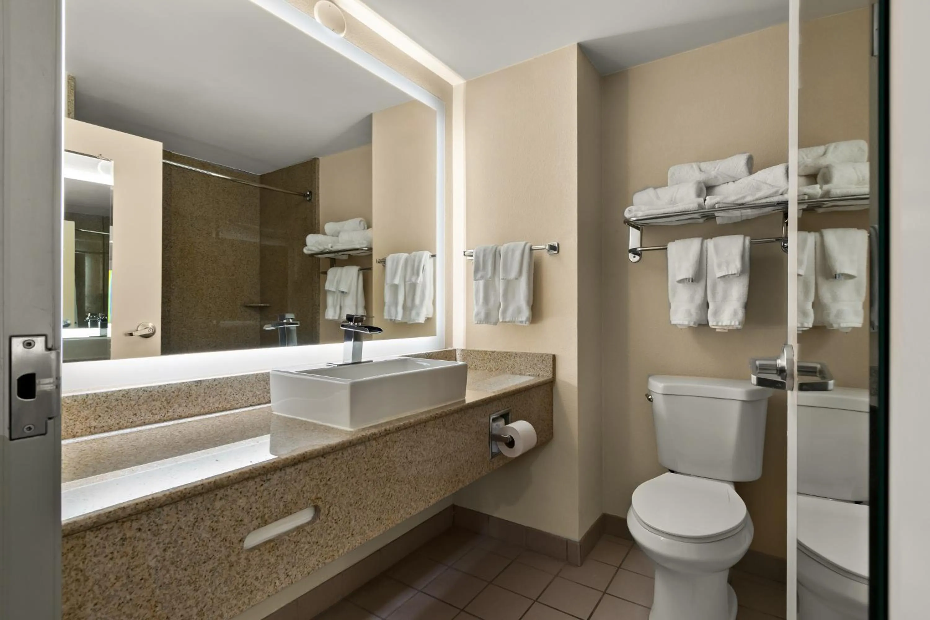 Toilet in Ramada by Wyndham Harrisburg/Hershey Area