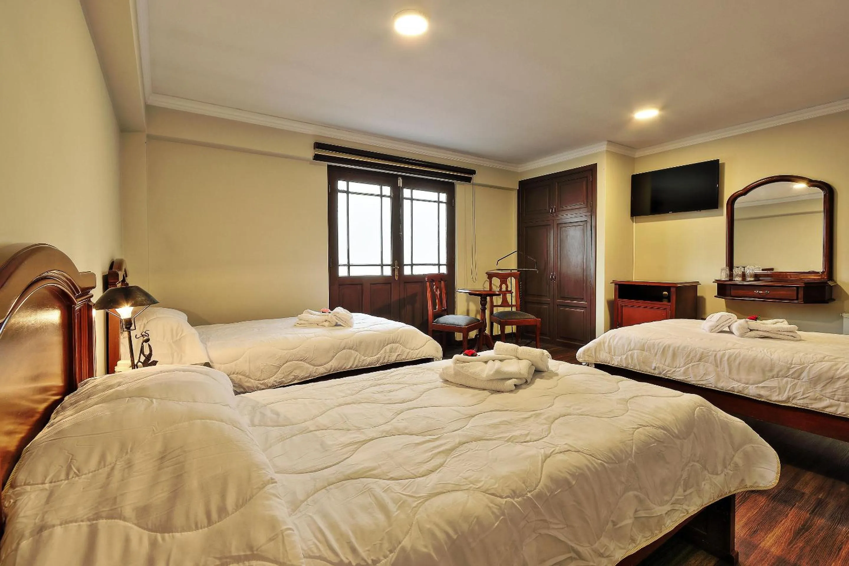 Photo of the whole room in Hostal Patrimonio - Potosi