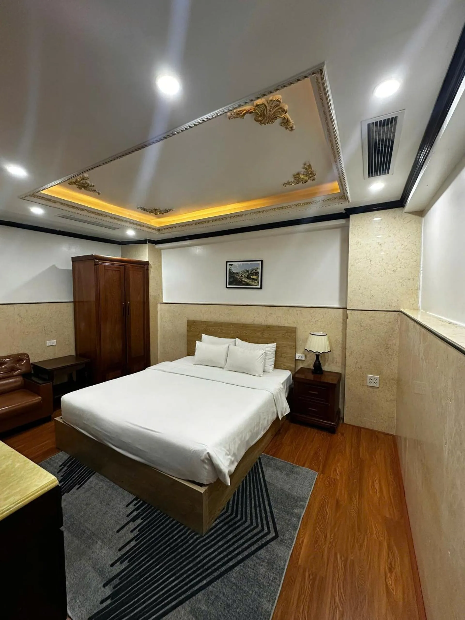 Bed in Du Palace Hotel & Travel