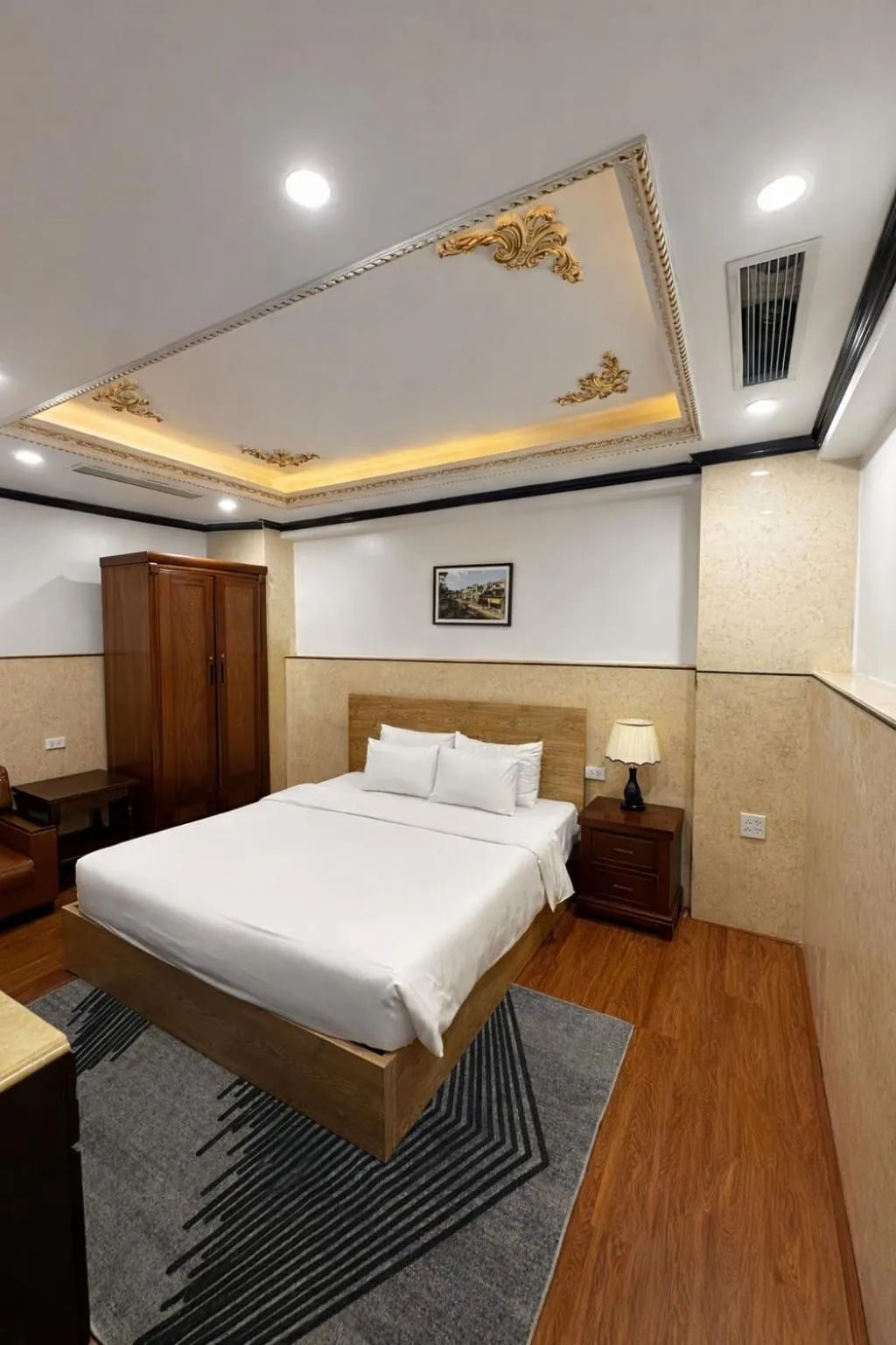 Bed in Du Palace Hotel & Travel