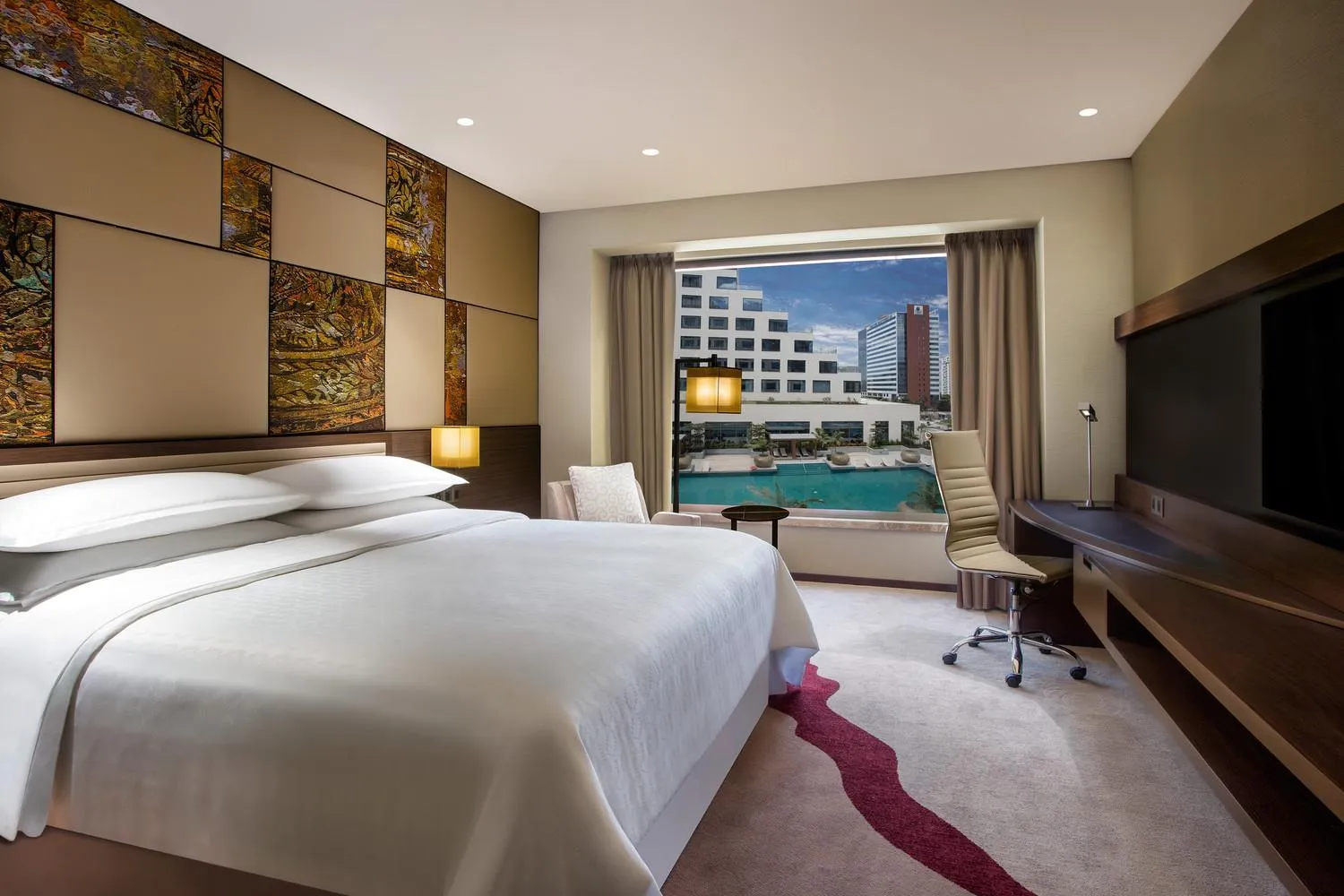 Pool view, Bed in Sheraton Grand Bengaluru Whitefield Hotel & Convention Center