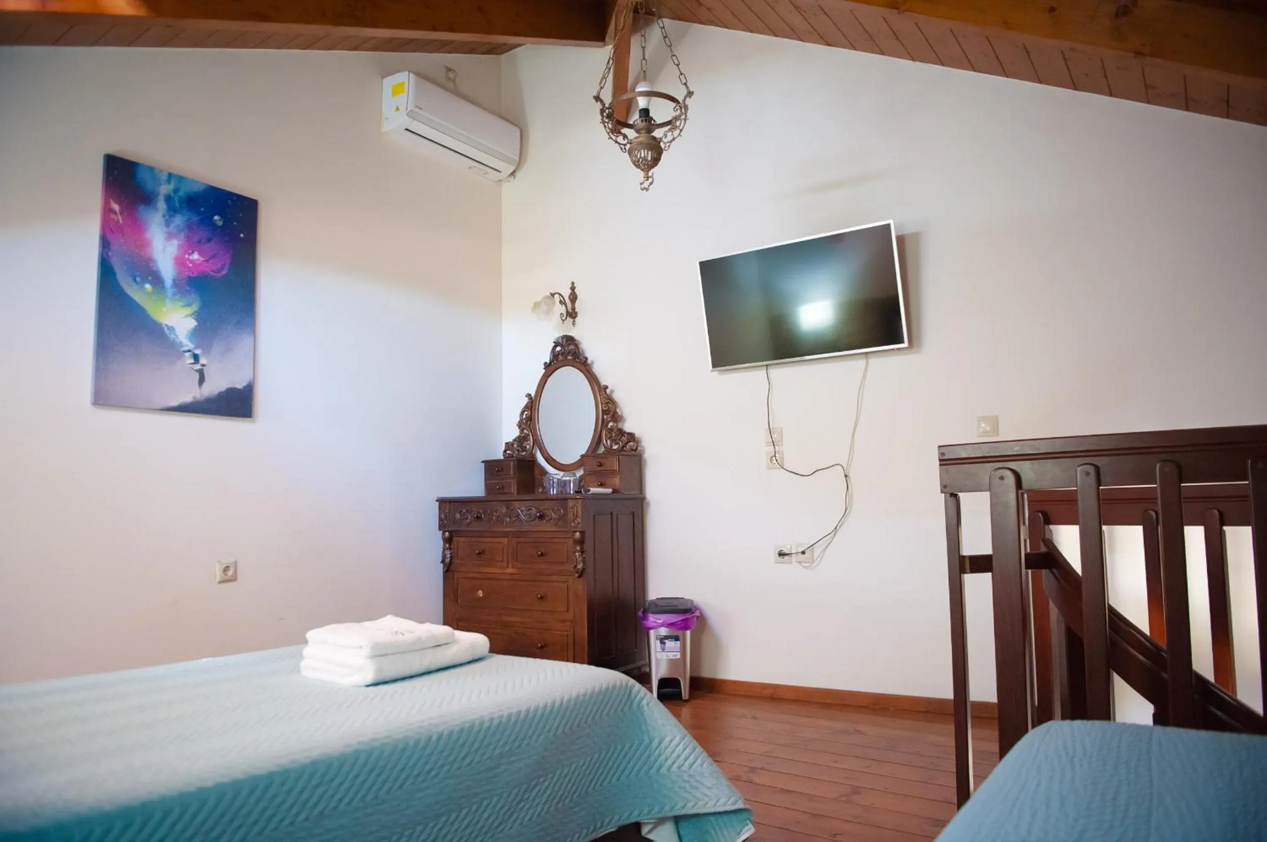 Photo of the whole room, Bed in SeaFront Stone Suites