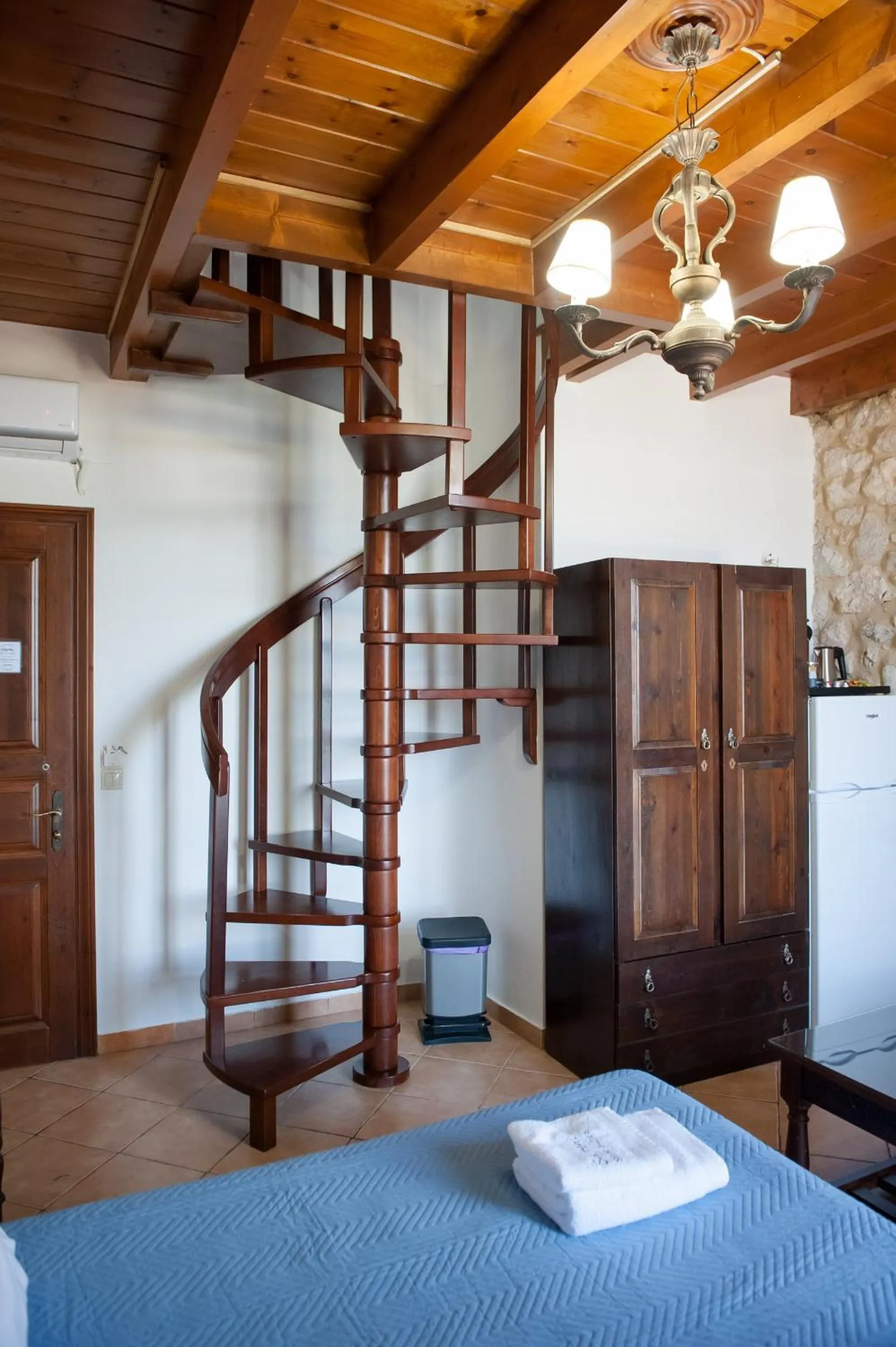 Photo of the whole room, Bed in SeaFront Stone Suites
