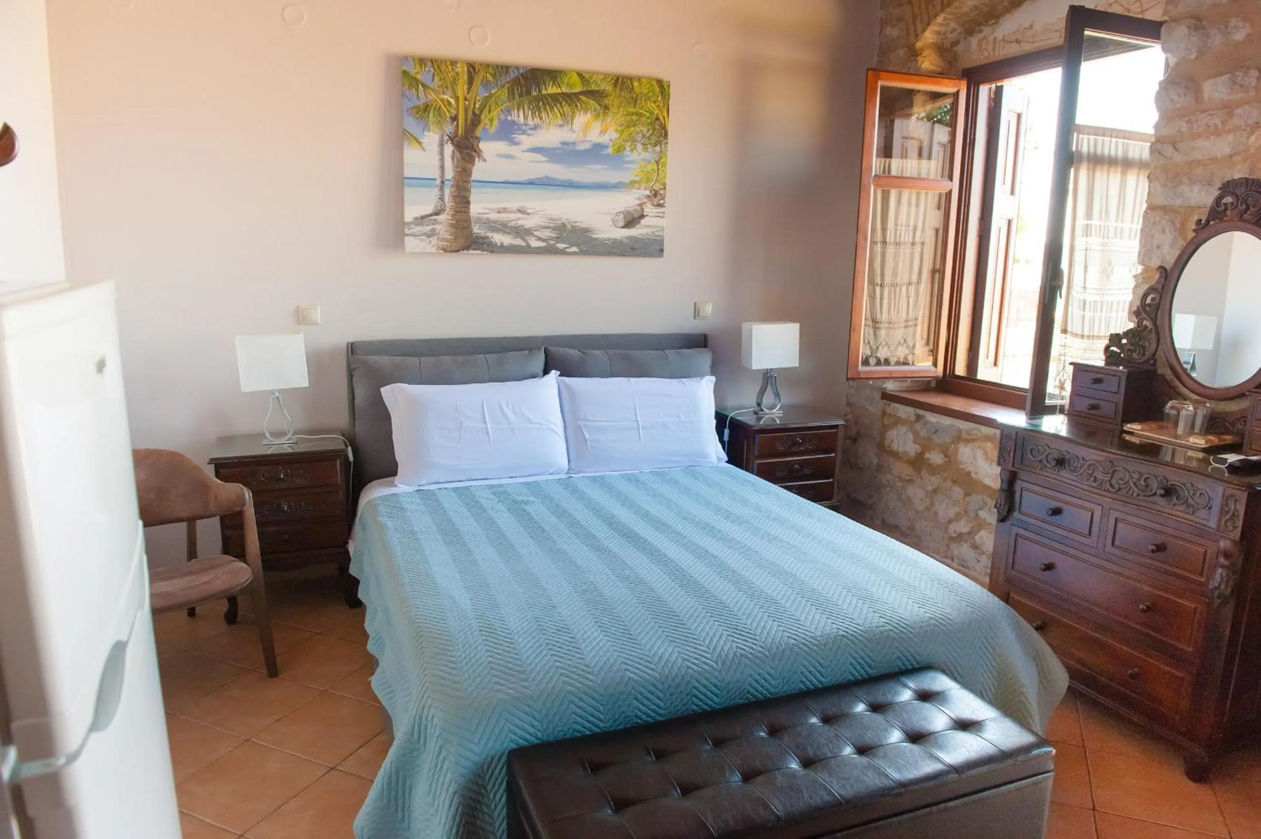 Photo of the whole room, Bed in SeaFront Stone Suites