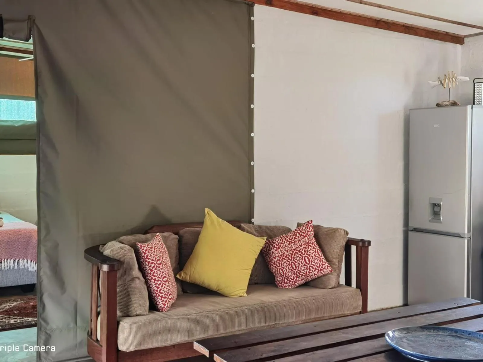 Seating area in Kingfisher Bush Lodge