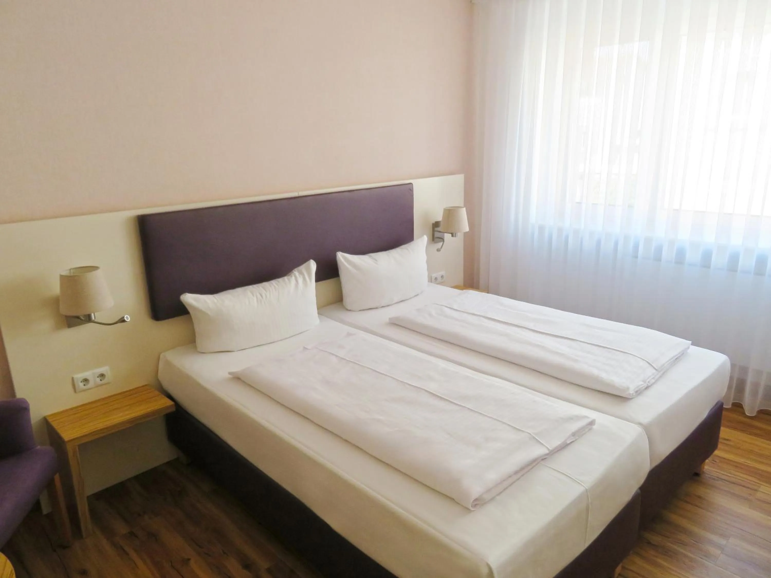 Bed in Rußmann Hotel & Living