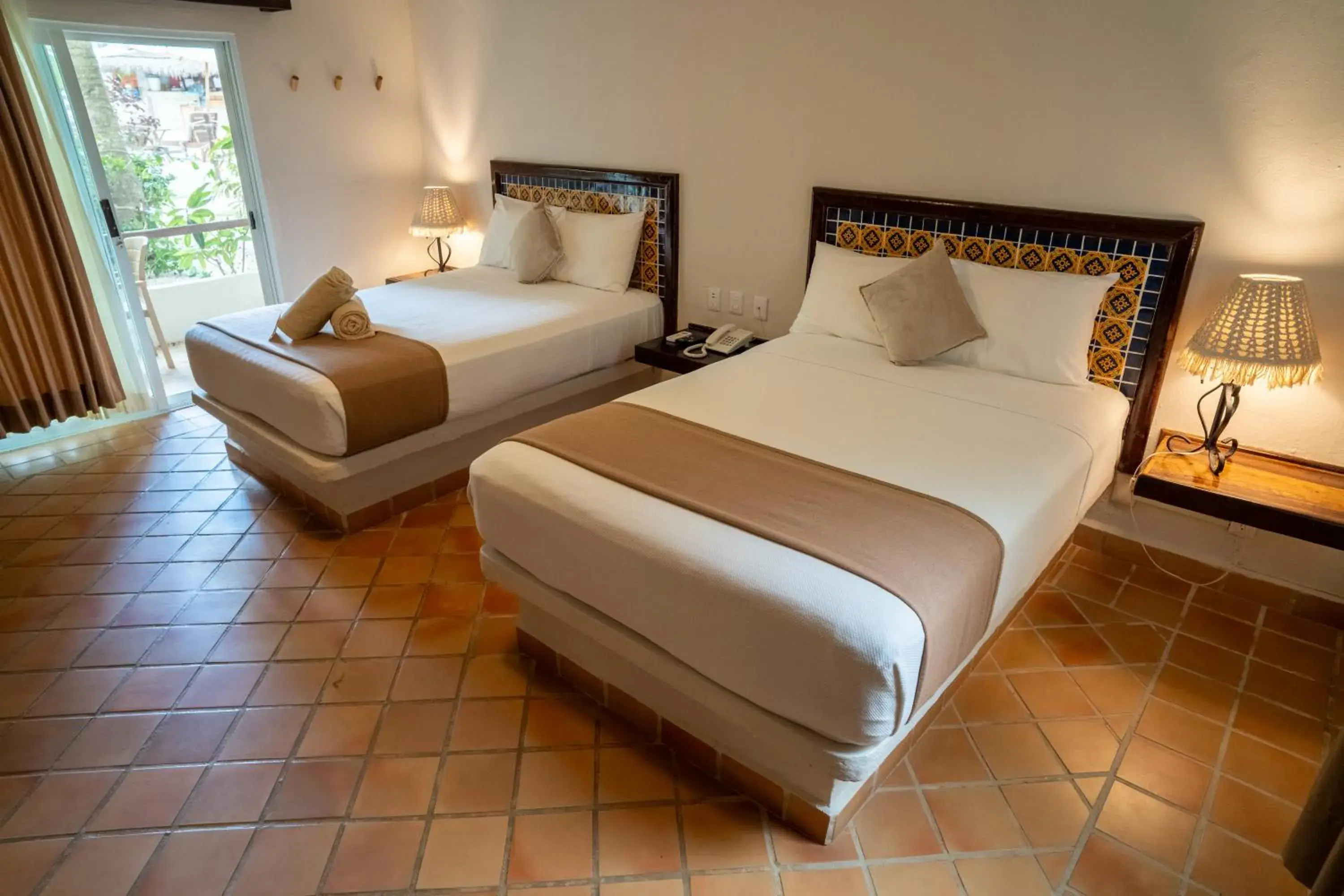 Bed in Petit Lafitte Beach Front Hotel & Bungalows Bed in Petit Lafitte Beach Front Hotel & Bungalows