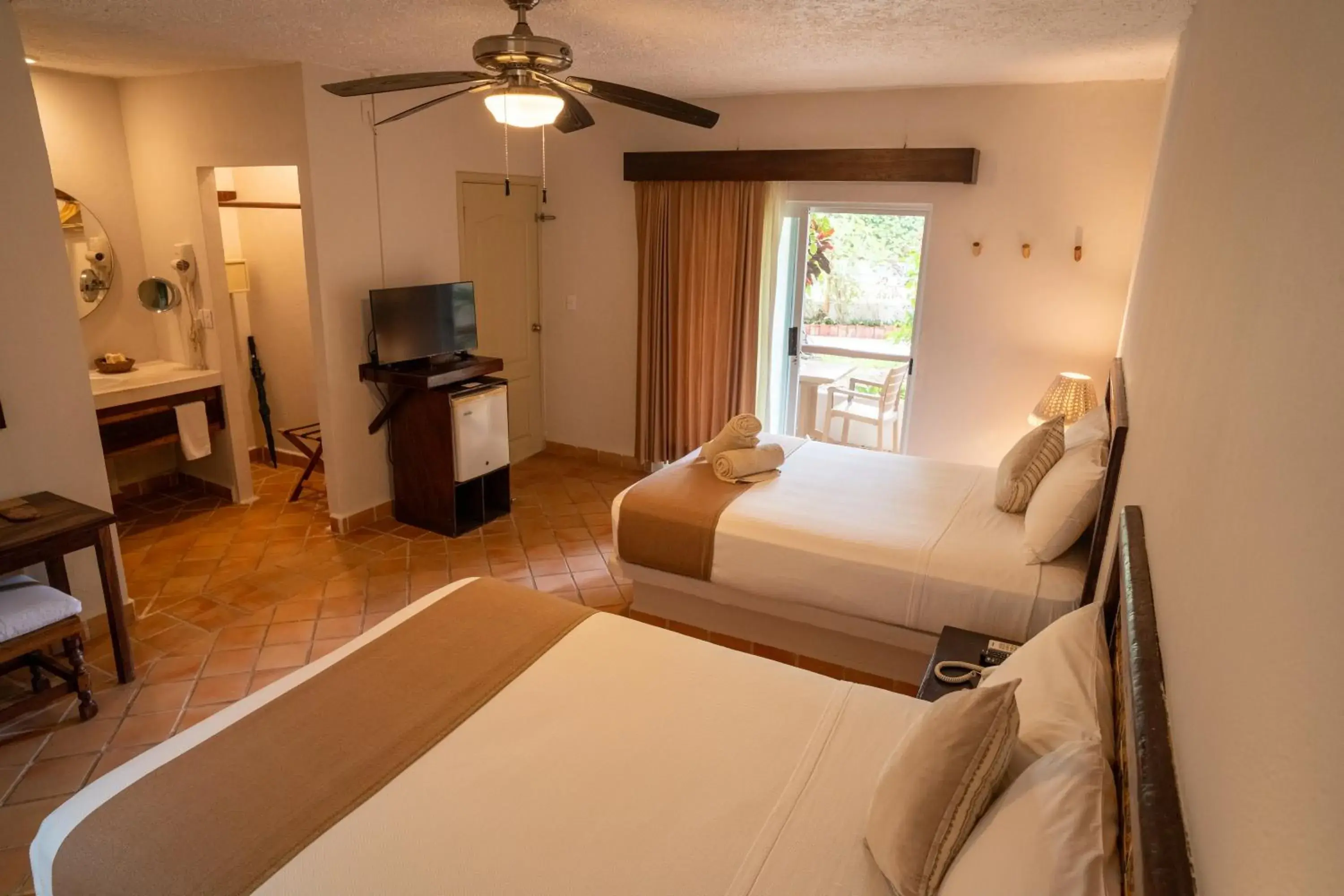 Bed in Petit Lafitte Beach Front Hotel & Bungalows Bed in Petit Lafitte Beach Front Hotel & Bungalows