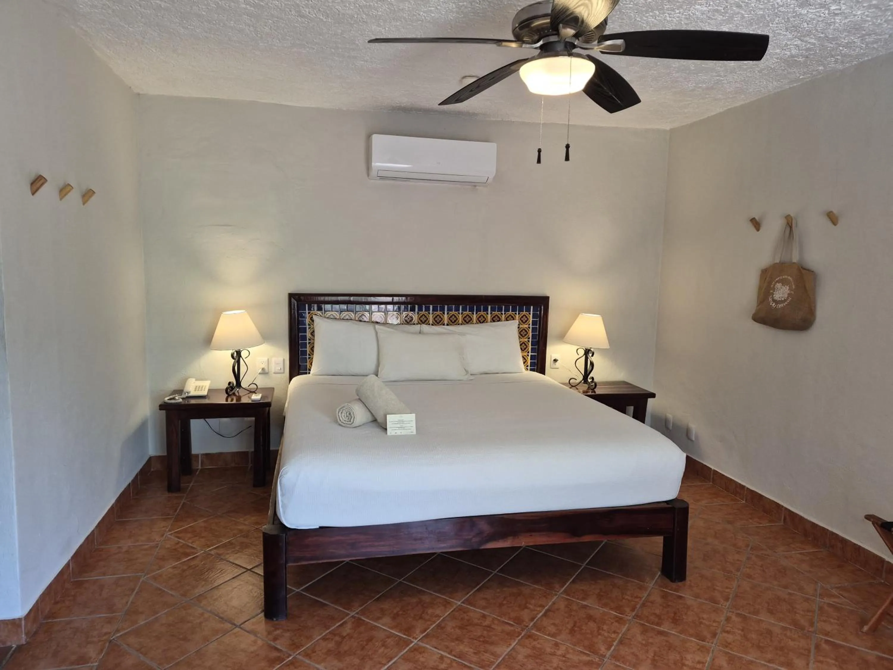 Bed in Petit Lafitte Beach Front Hotel & Bungalows