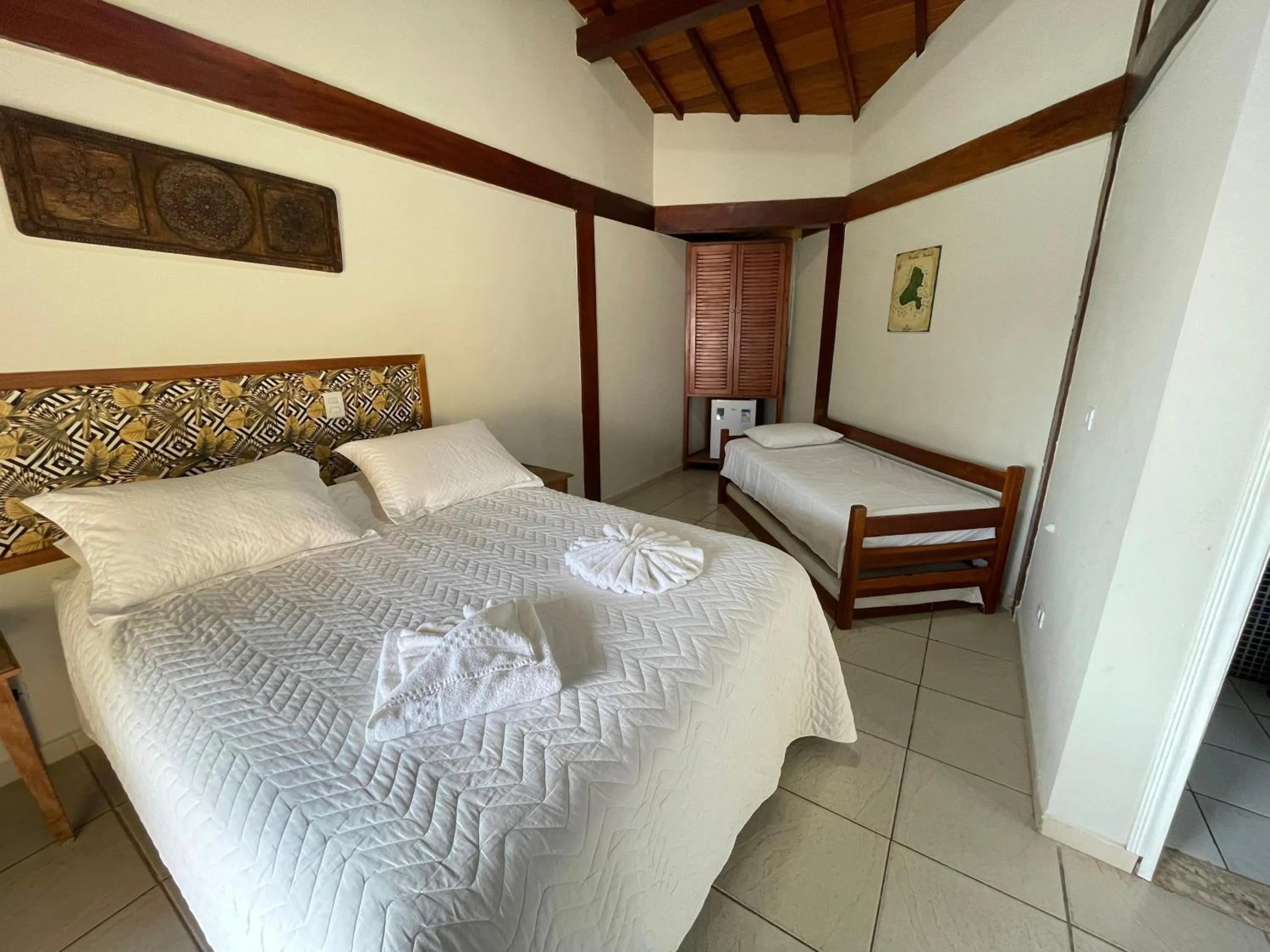 Bed in Pousada Bonns Ventos