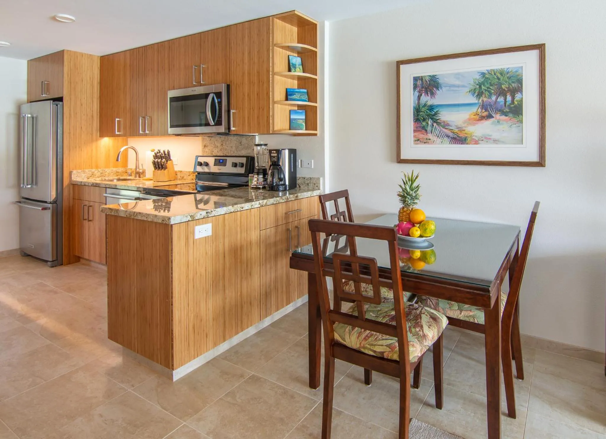 Dining area in Nāpili Surf Beach Resort by Castle