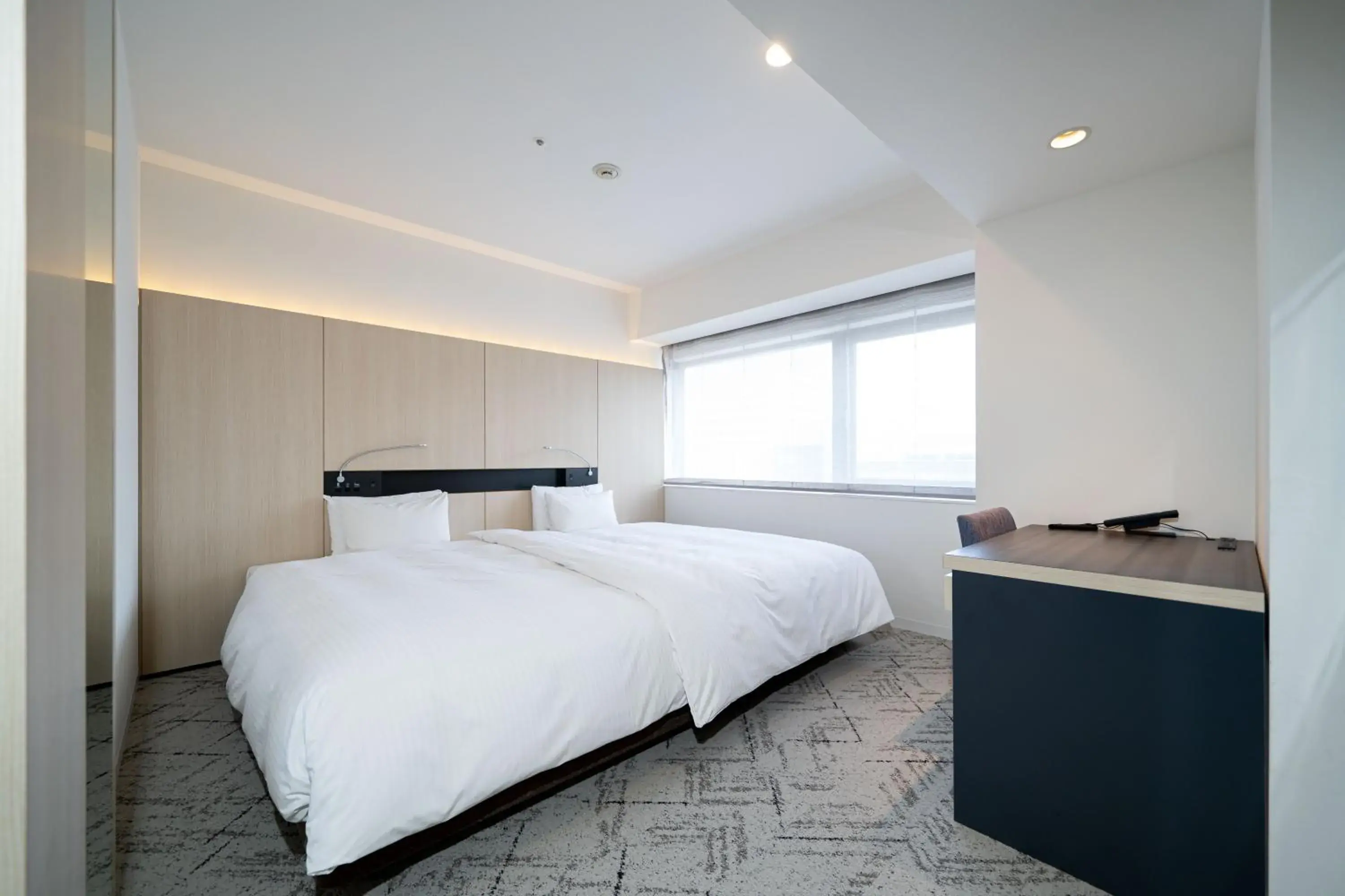 Bed in Hotel Sunroute Tokushima Bed in Hotel Sunroute Tokushima