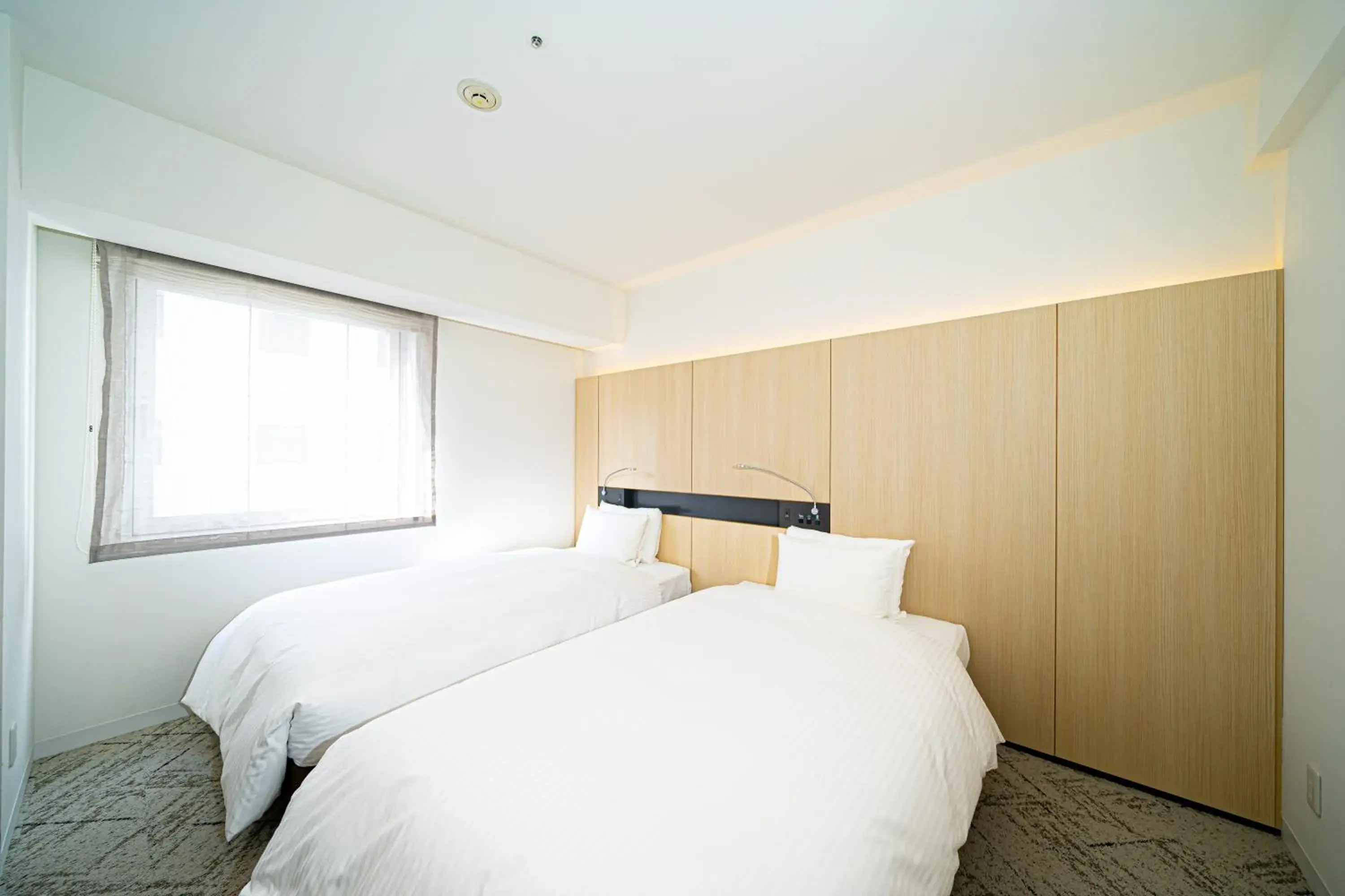 Bed in Hotel Sunroute Tokushima Bed in Hotel Sunroute Tokushima