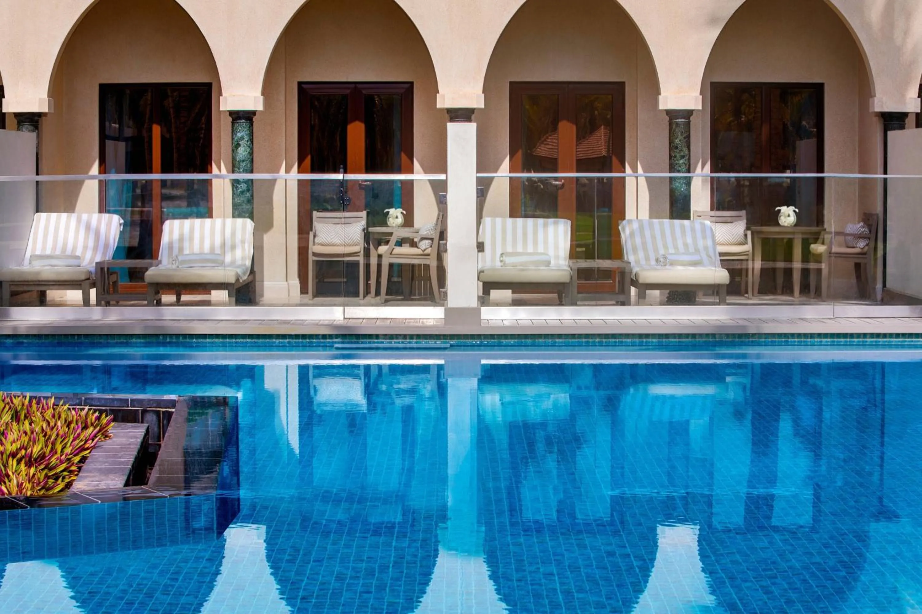 Swimming pool in Al Bustan Palace, a Ritz-Carlton Hotel