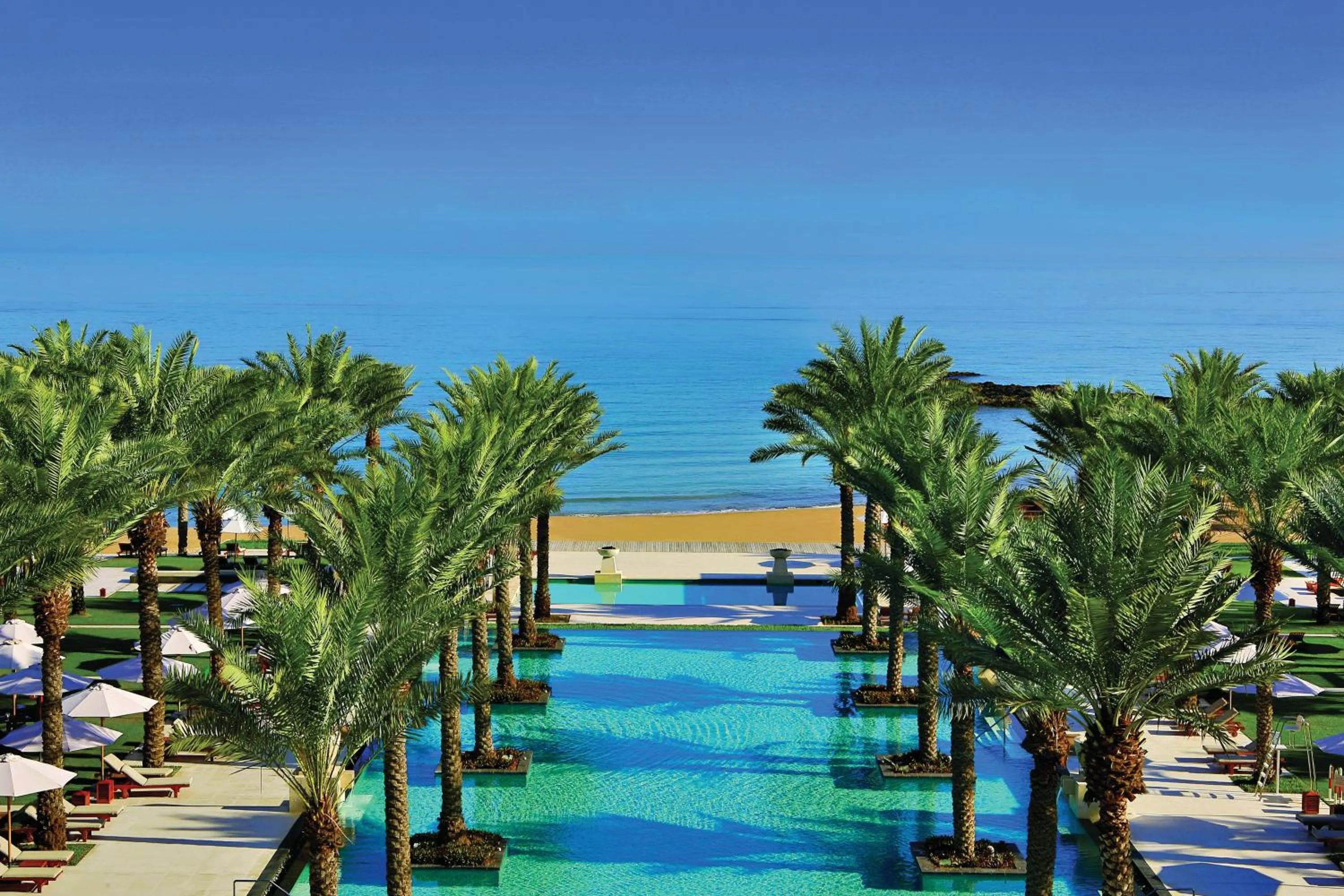 Swimming pool in Al Bustan Palace, a Ritz-Carlton Hotel