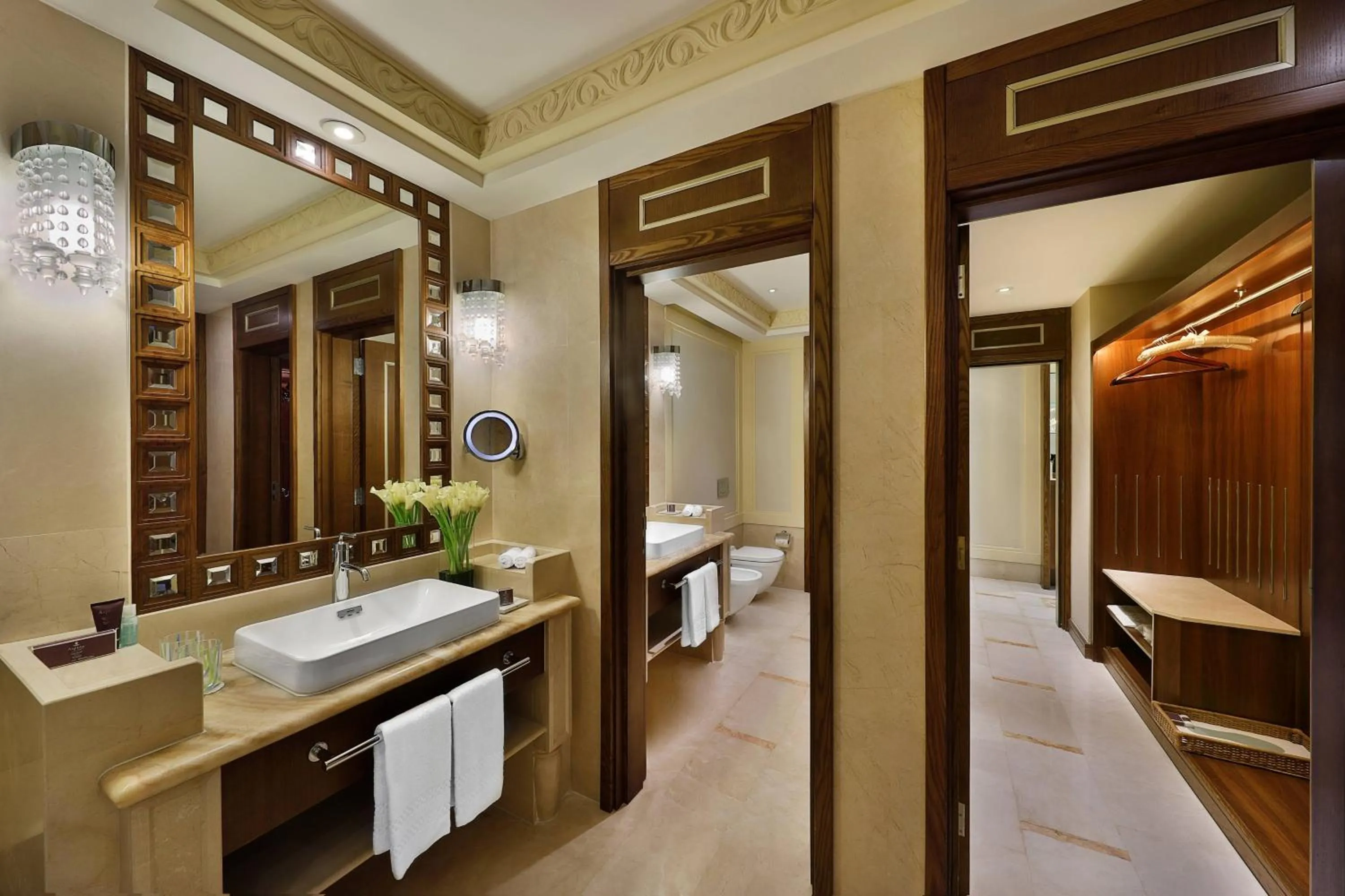 Bathroom, Bed in Al Bustan Palace, a Ritz-Carlton Hotel