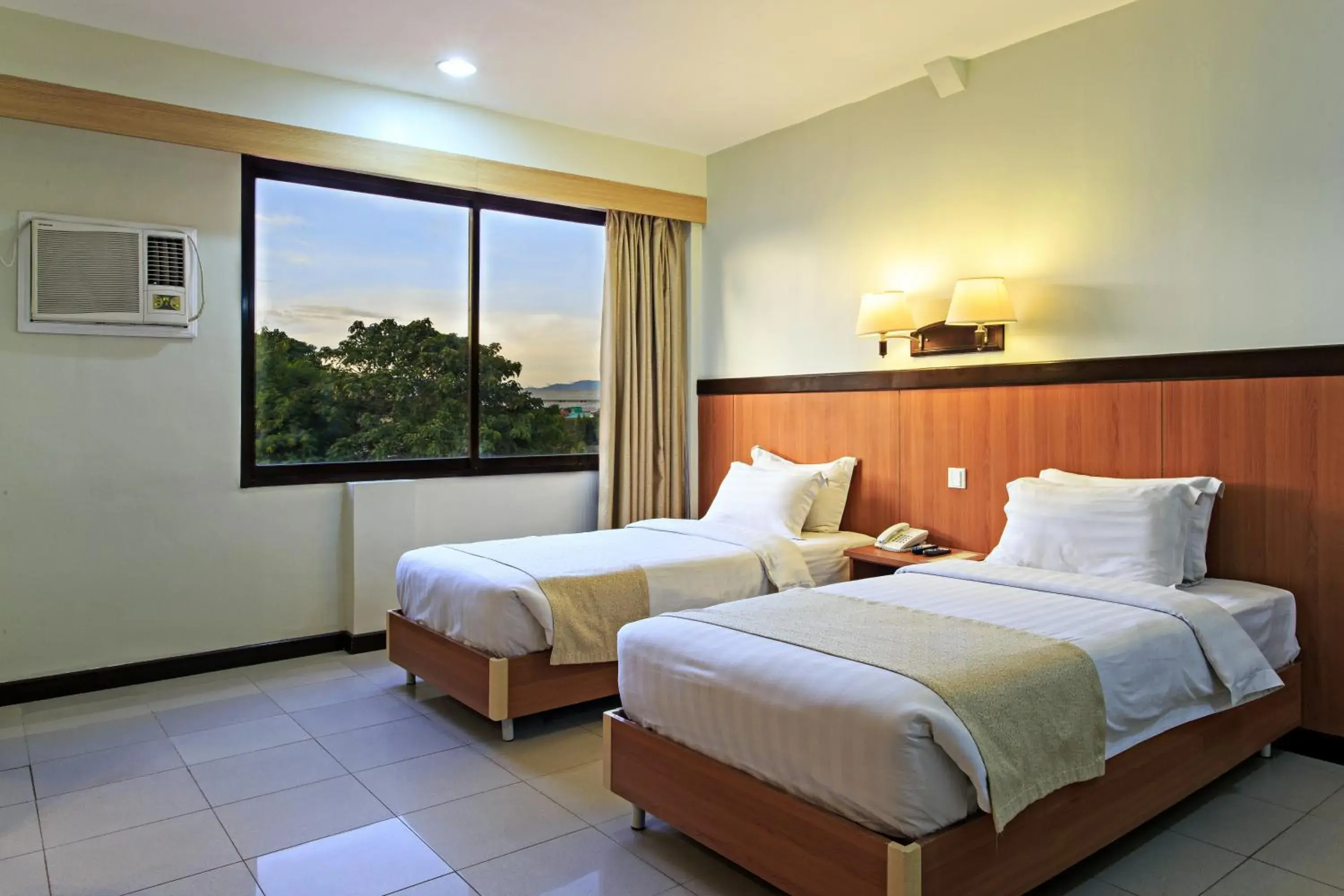 View (from property/room), Bed in The Orchard Cebu Hotel & Suites powered by Cocotel View (from property/room), Bed in The Orchard Cebu Hotel & Suites powered by Cocotel