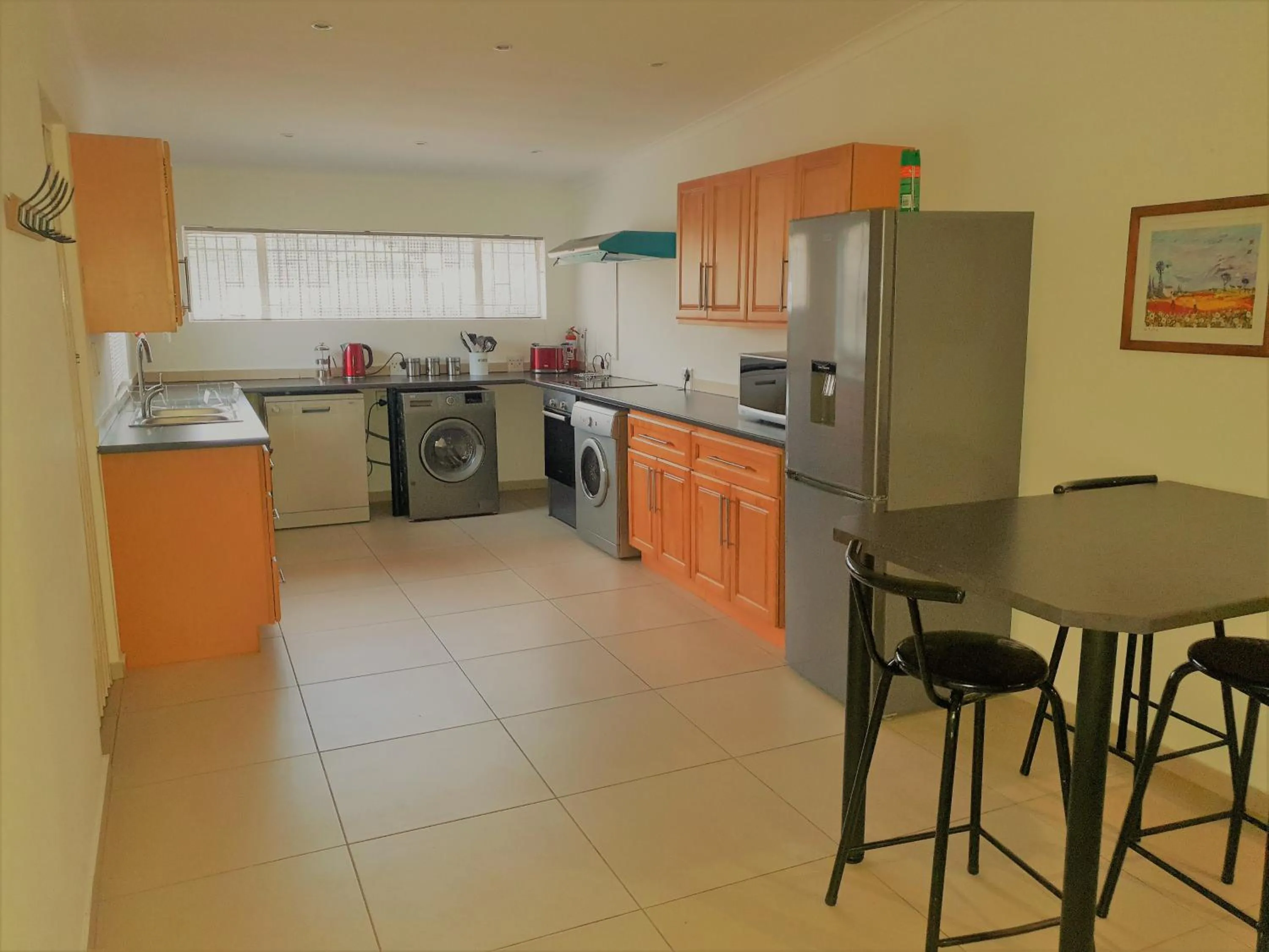 Kitchen or kitchenette in Moonflower Cottages