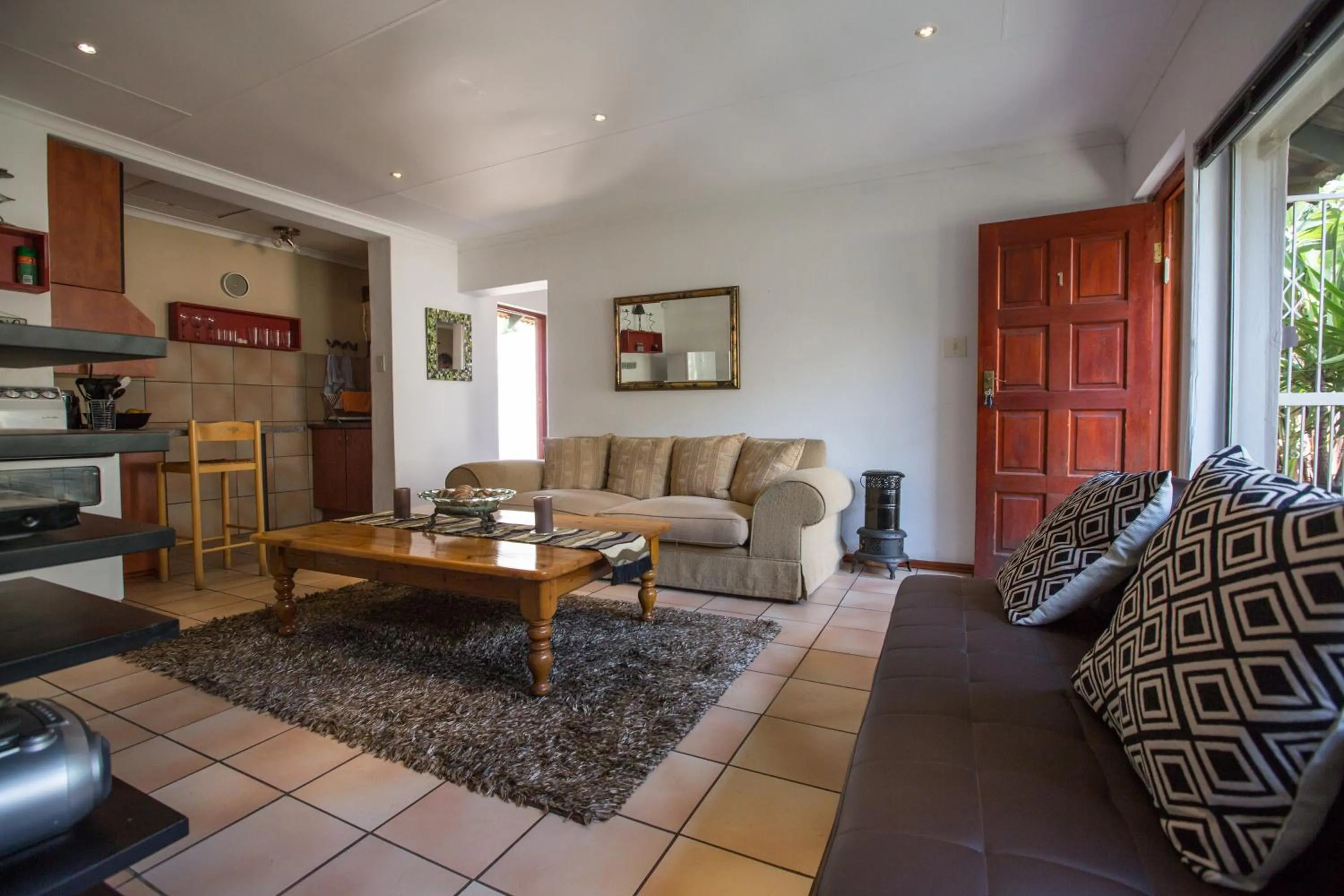 Kitchen or kitchenette in Moonflower Cottages